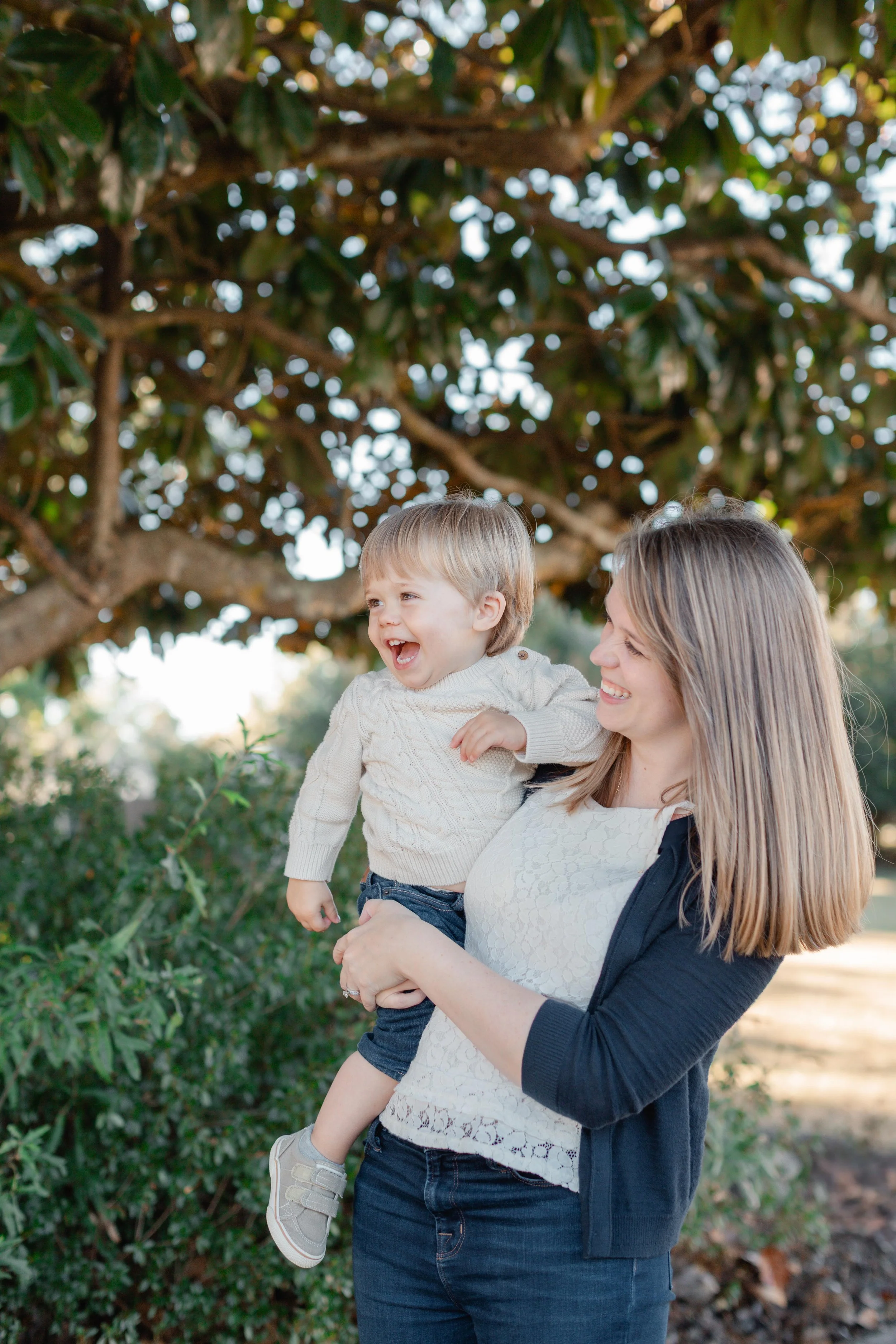Mother holding toddler boy during photo shoot in Greenville SC