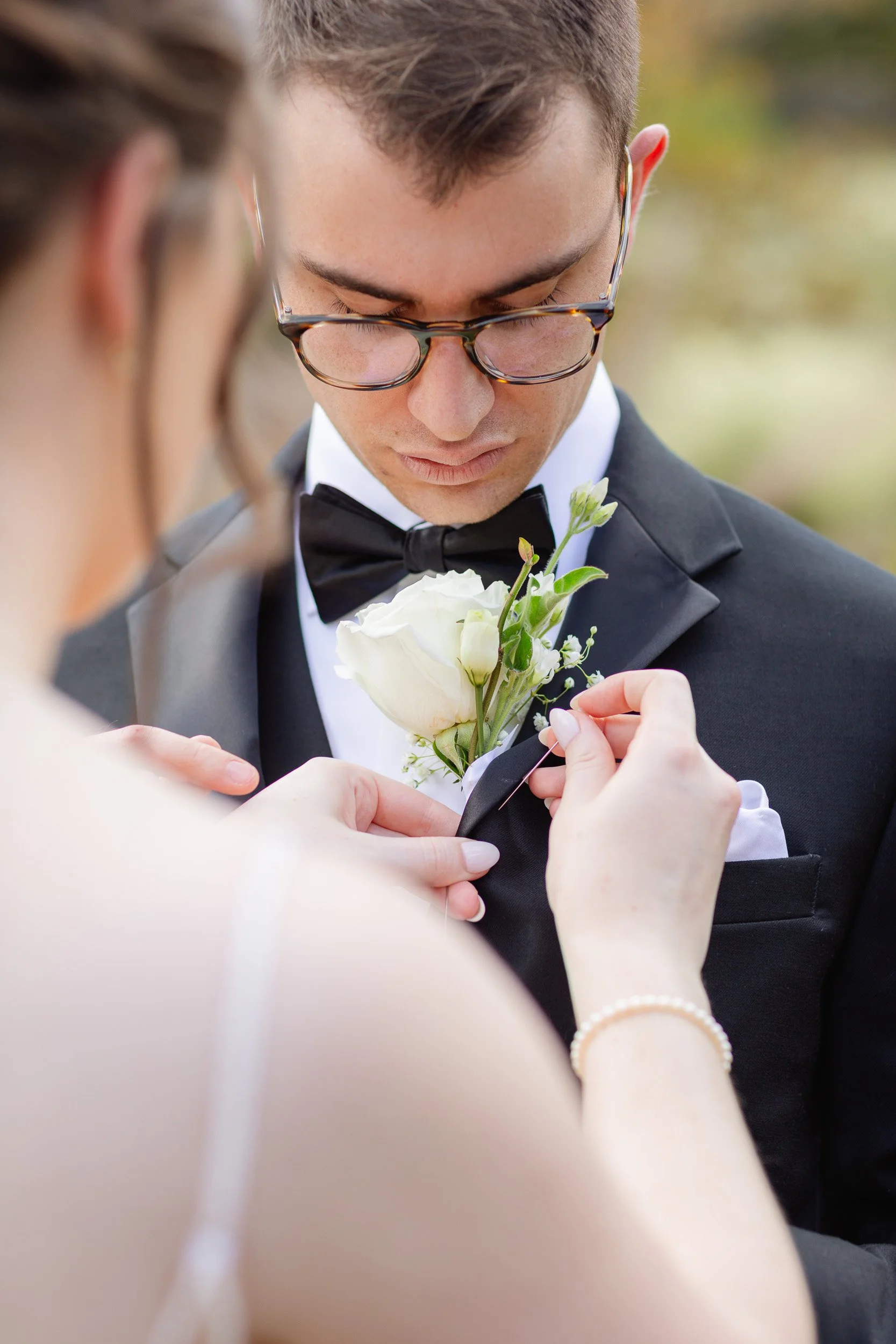 A groom and bride detail shot getting ready for intimate wedding in Greenville, SC