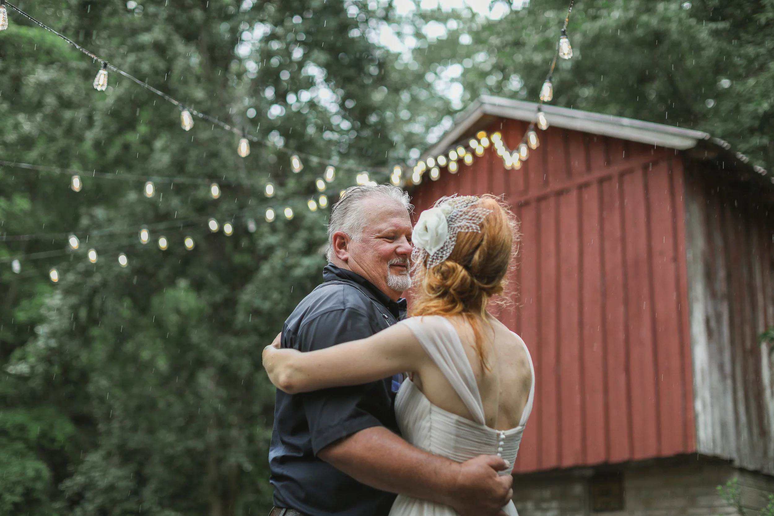 A father and daughter dancing in backyard wedding in Clemson, SC
