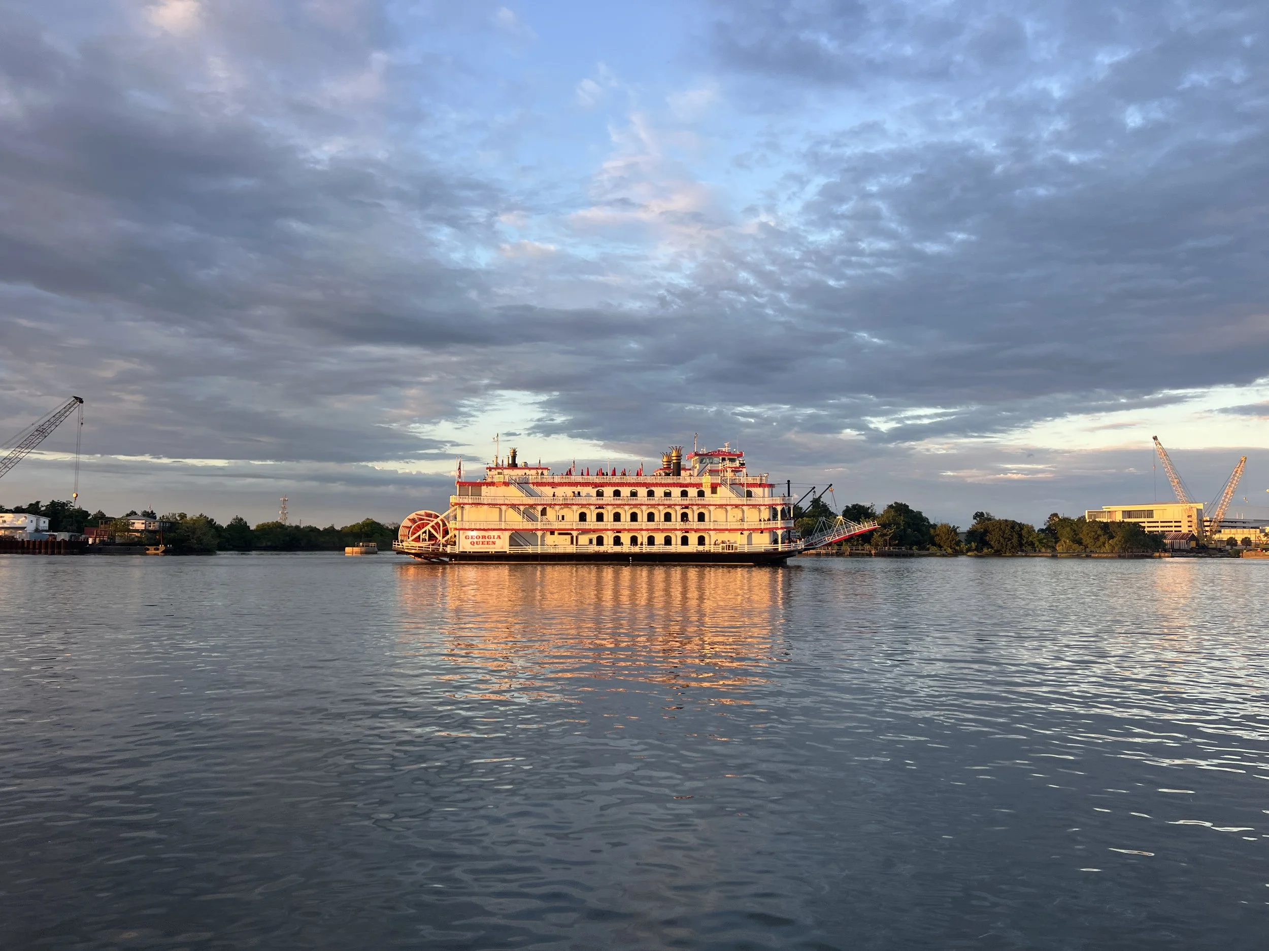 A classic riverboat at sunset on the Savannah River — an iconic view to end a romantic day in the city.
