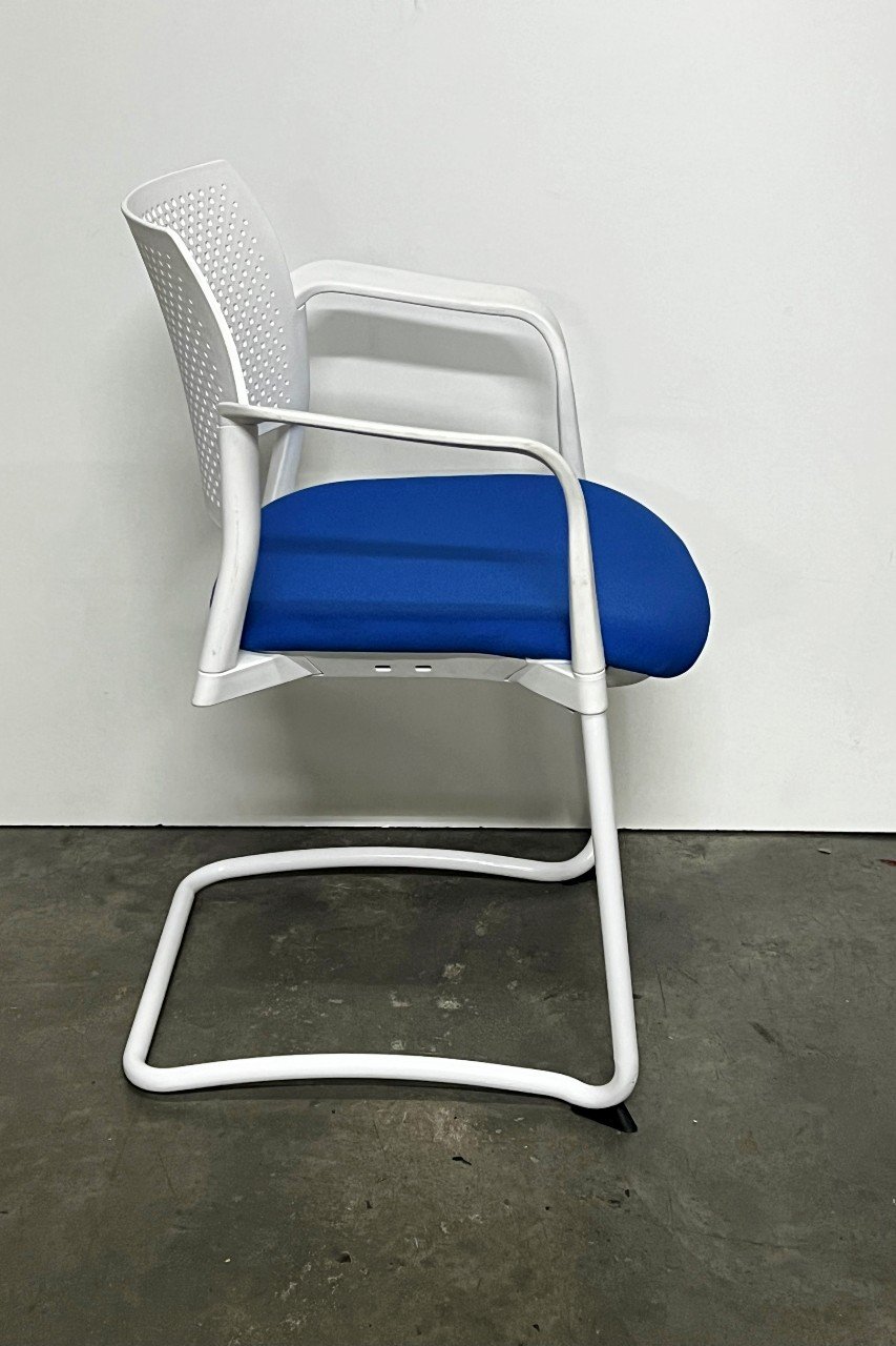 Conference table chairs in white and blue side.jpg