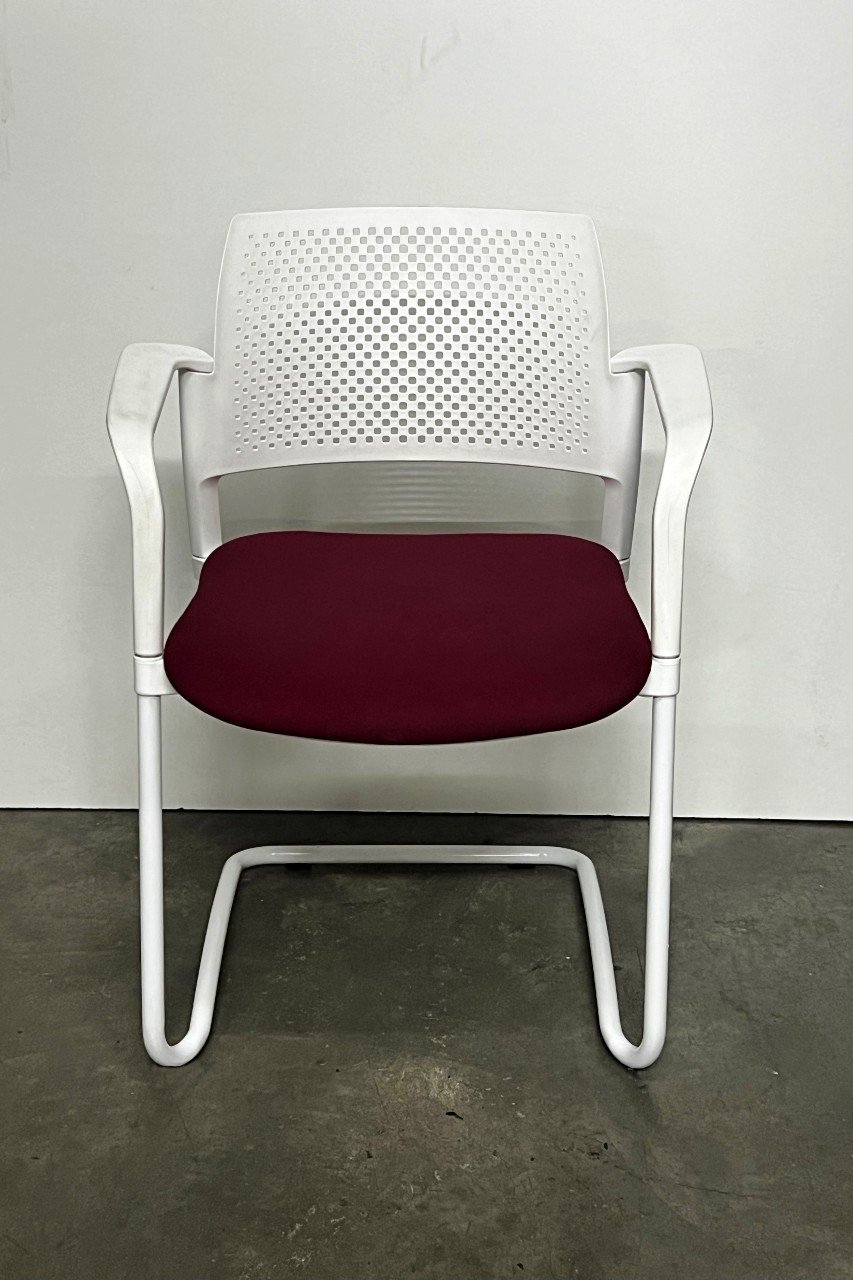 Conference table chairs in white and burgundy side.jpg