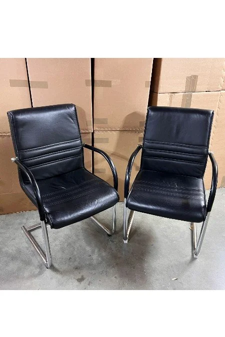 used black leather armchairs.jpg