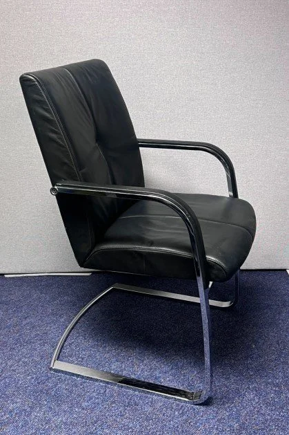 Used Klober black leather cantilever armchair.jpg