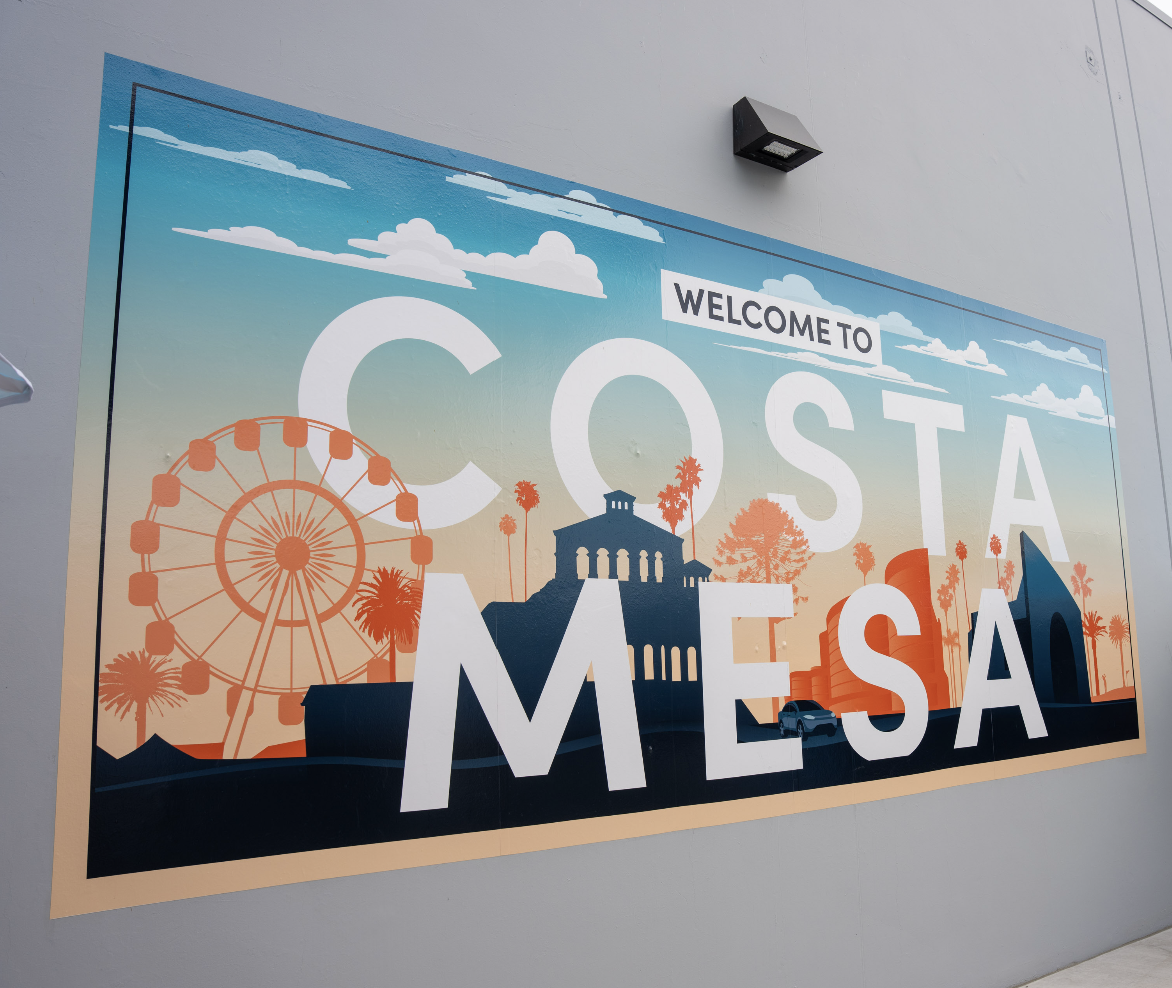 Costa Mesa Mural featuring ferris wheel and buildings throughout the area