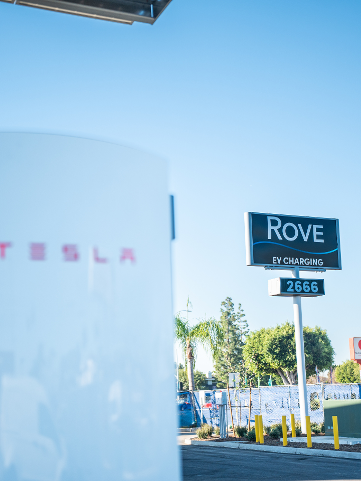 Tesla V4 Supercharger at Rove Costa Mesa with Sign in the background