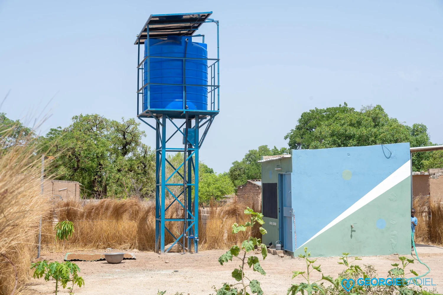 Water tower with solar panel