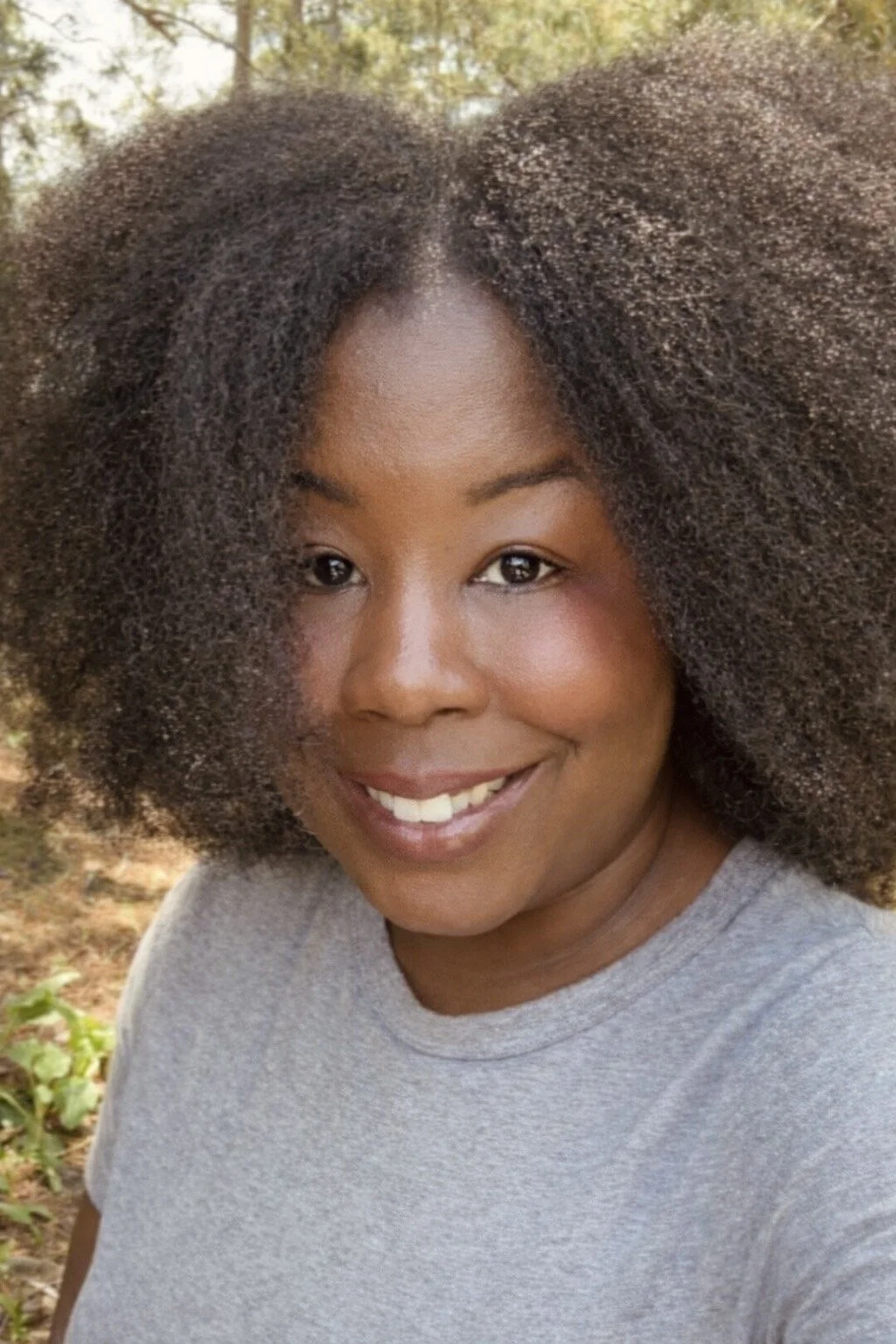 Shakeema Smalls, wearing a grey tshirt