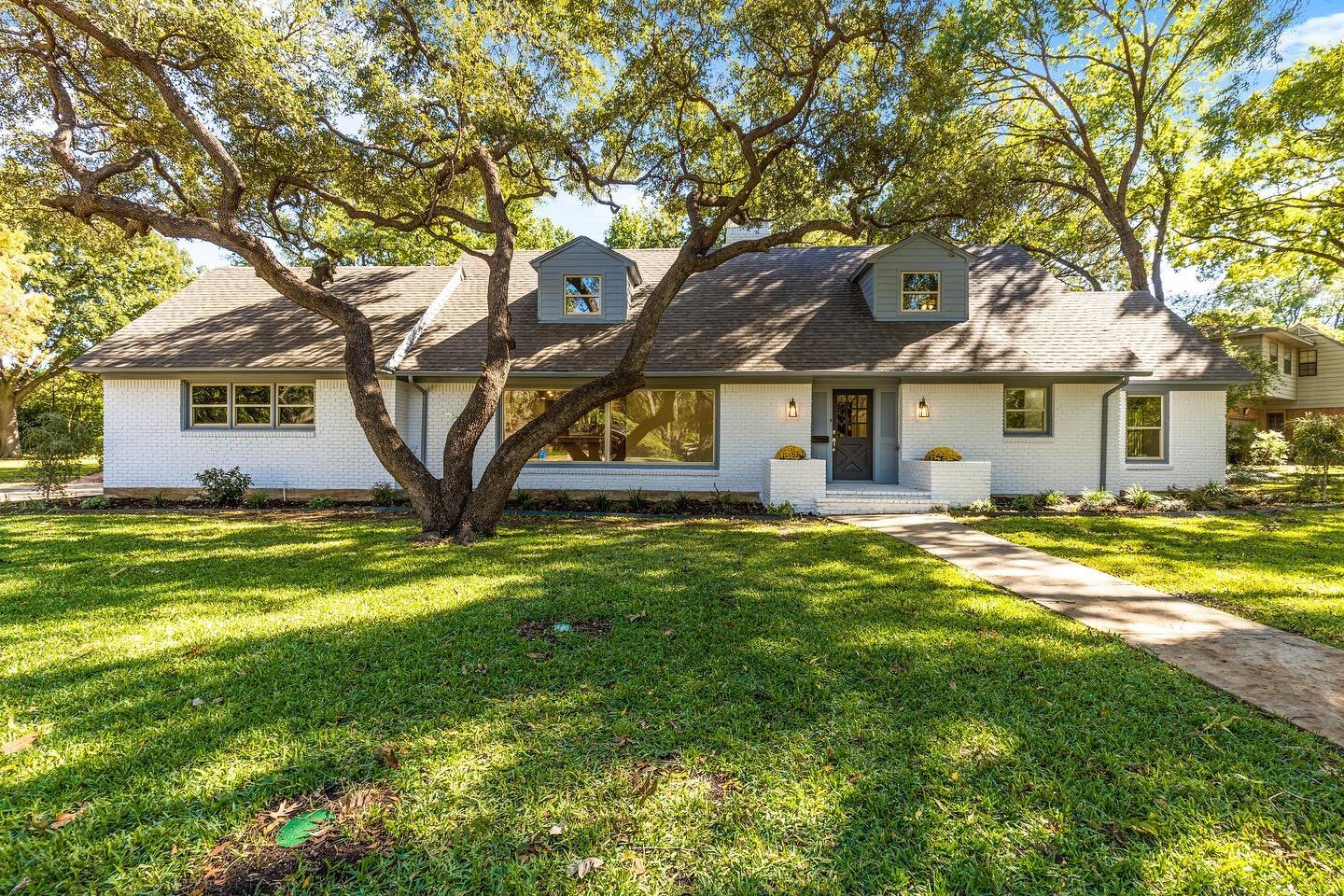Renovated in 2022, this Midway Hollow gem is on the market for under $1M

Refinished hardwood floors flow seamlessly room to room, connecting the kitchen, living areas, and dining areas effortlessly. The kitchen creates a modern aesthetic with Quartz