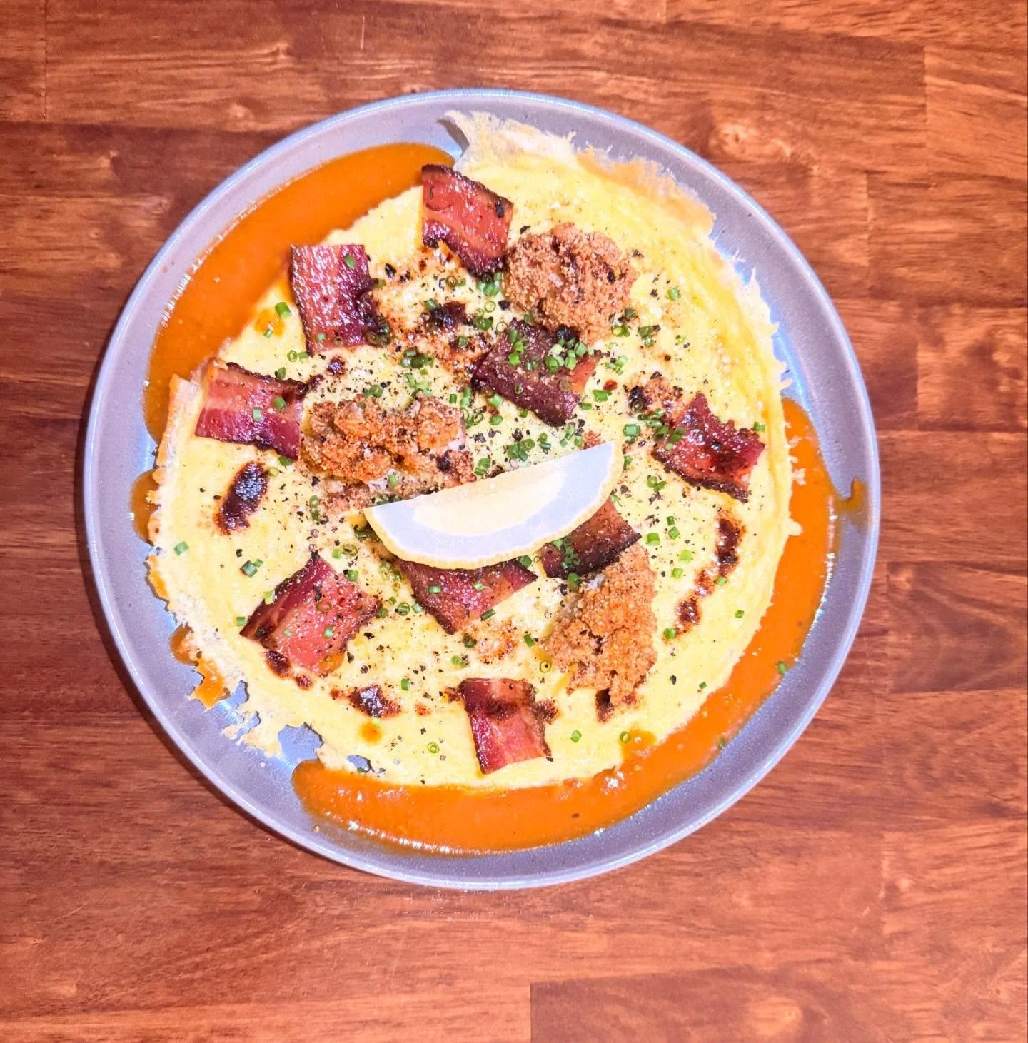 Rumor has it a gold miner who struck it rich walked into a bar and wanted the 3 most expensive ingredients on one plate. BACON. OYSTERS. EGGS. 
The hang-town fry was invented. 

Sunday. 10-2. Voted the best brunch in Michigan for a second week strait