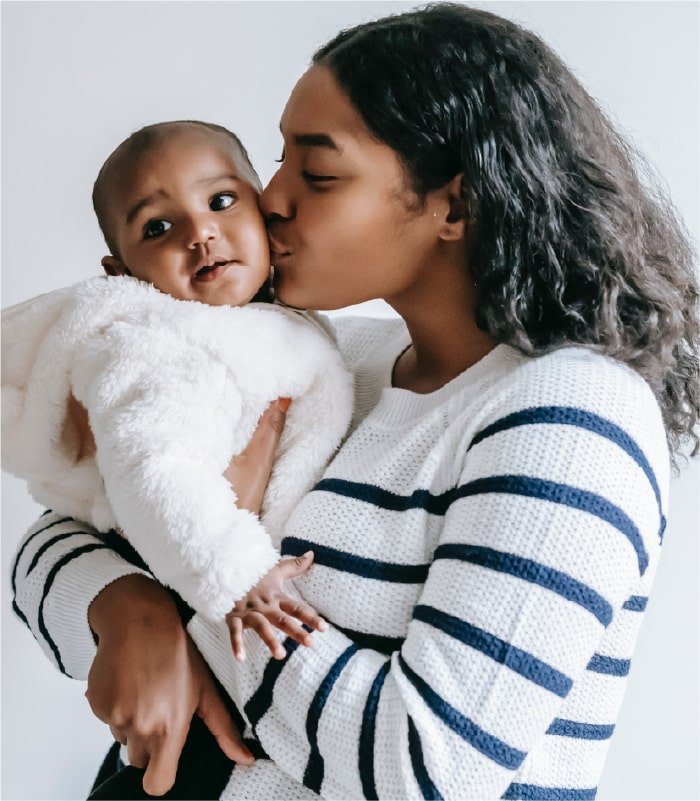 mother kissing baby.jpg