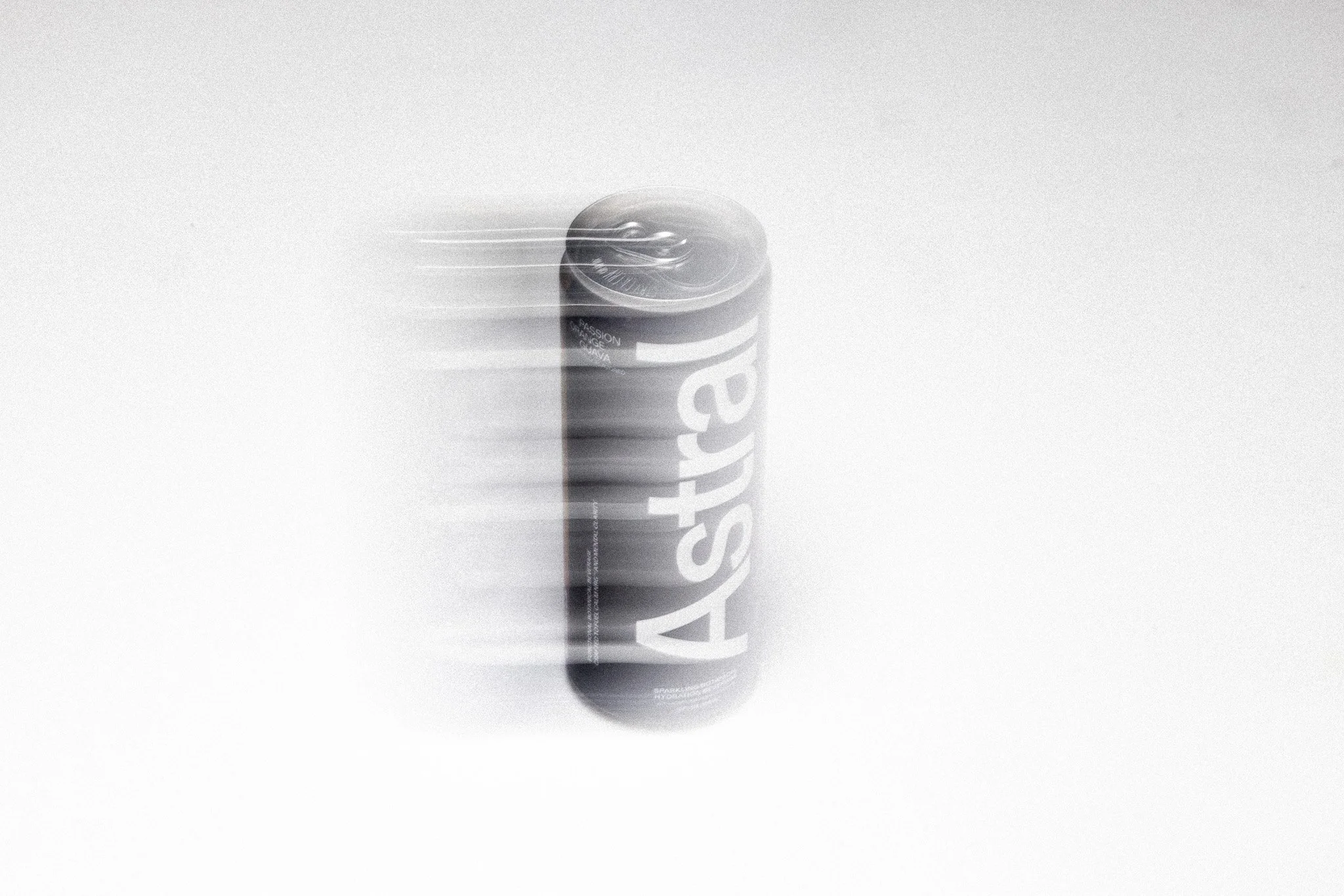 A can of Astral Calm with motion blur effects on a plain white background.