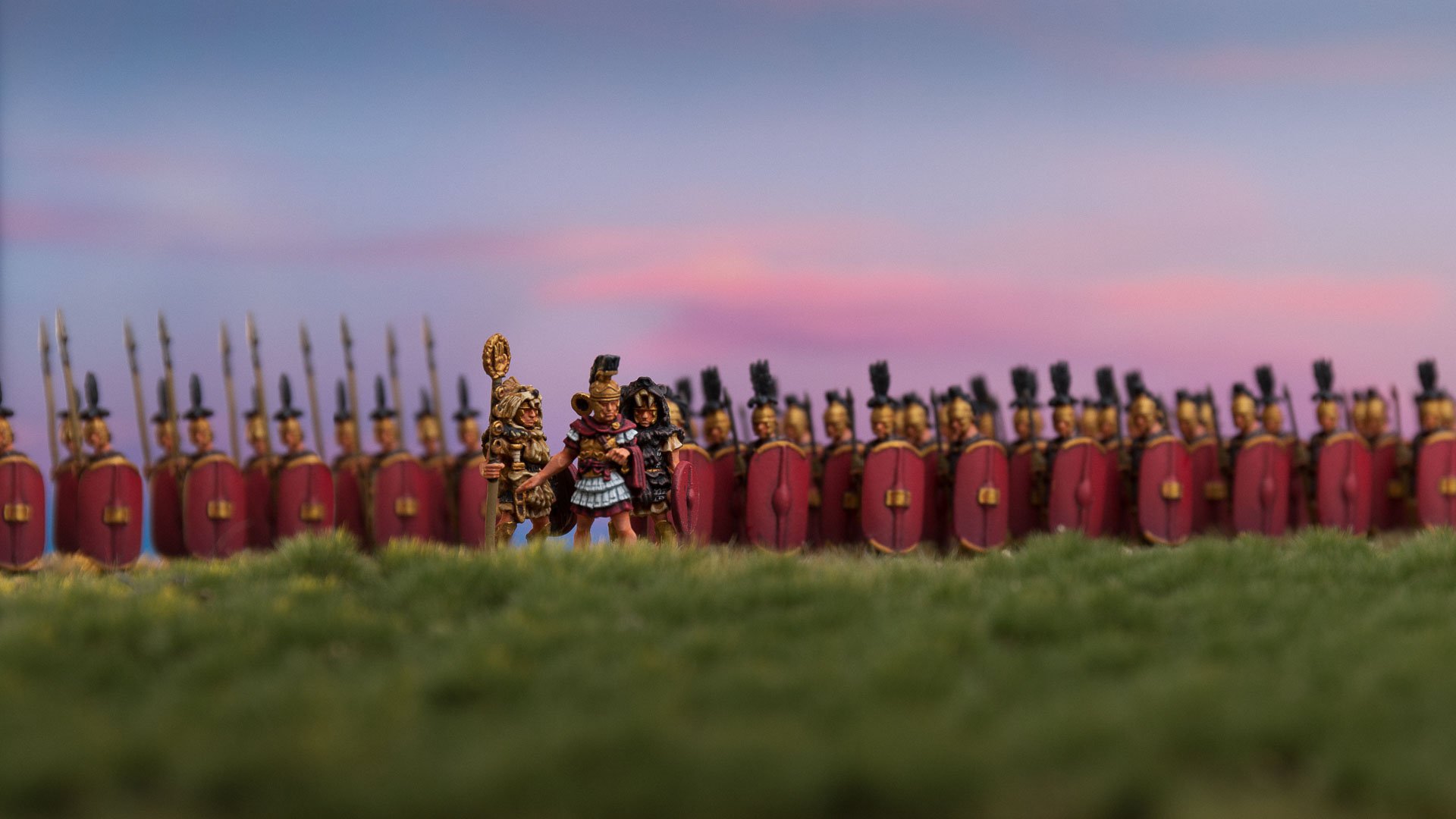  A consul accompanied by an aquilifer and cornicen looks out at the battlefield as the sun sets. Behind him the triarii and the principes patiently awaits their orders.  
