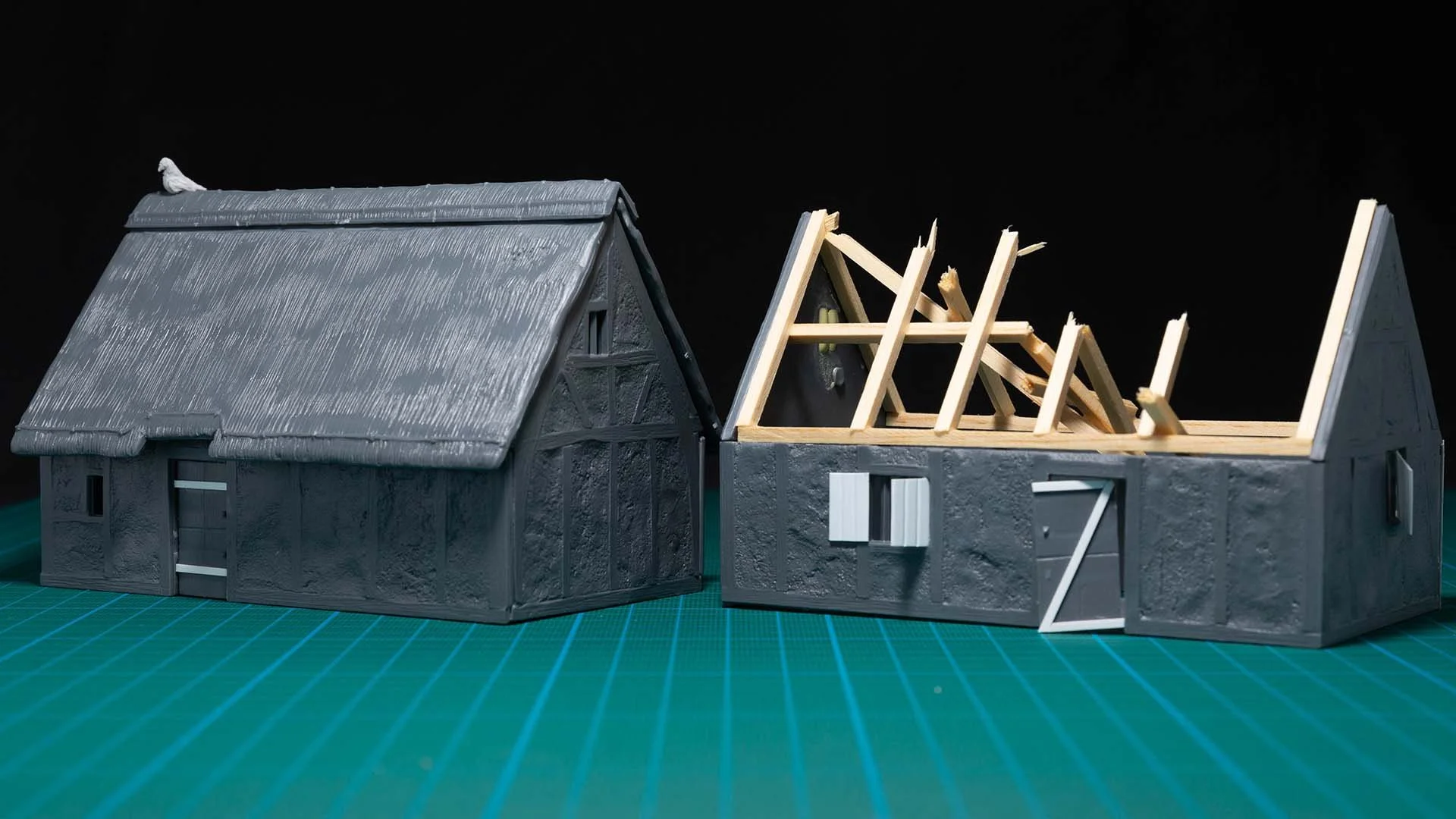  Just some small details on the door on the house on the left, added a pigeon for interest on the roof. The caved in roof on the right was the hardest and most time consuming part to do. 