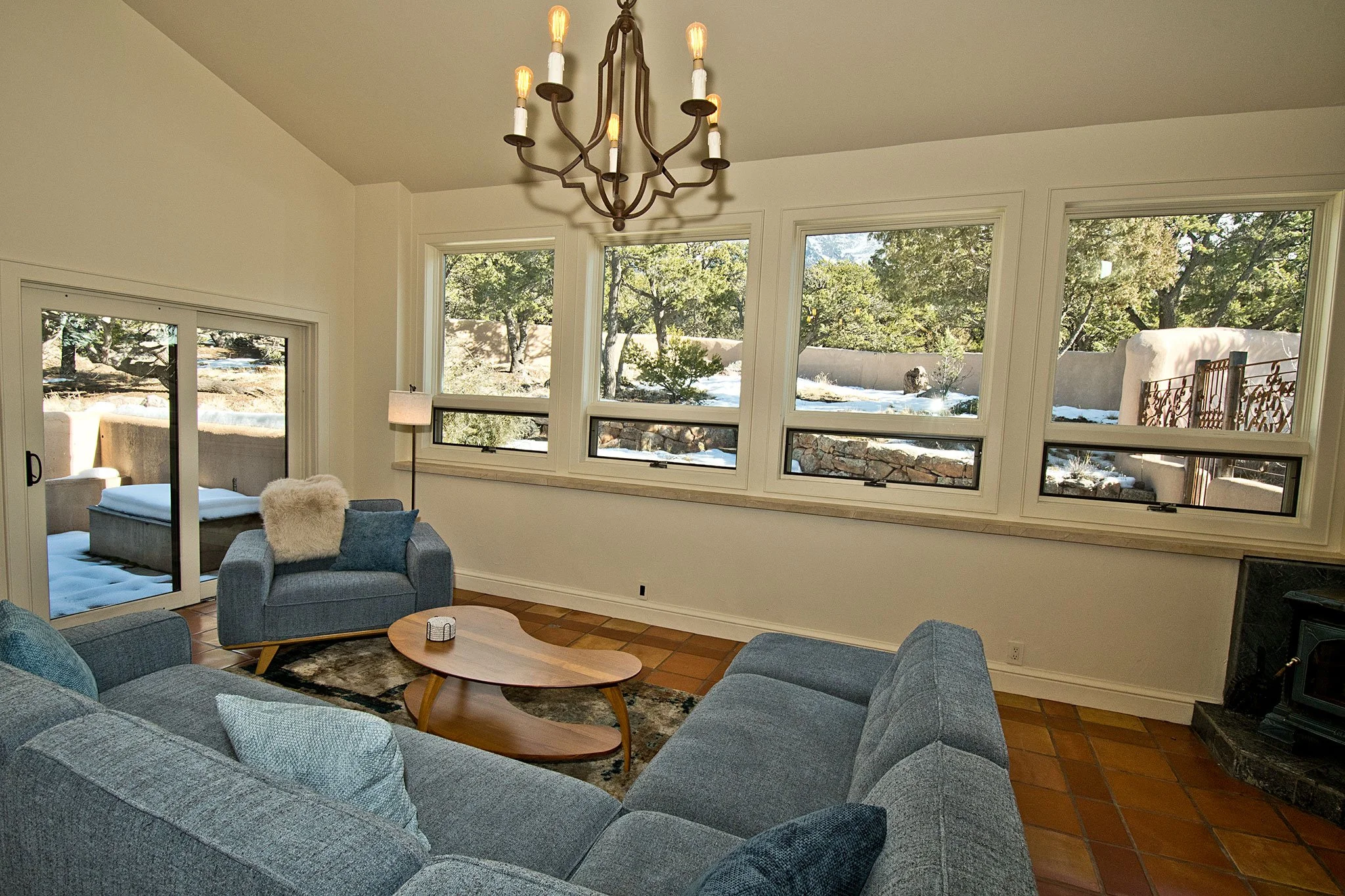 Living Area with Cozy Couch and Stunning Views of the Sangre de Cristo Mountains
