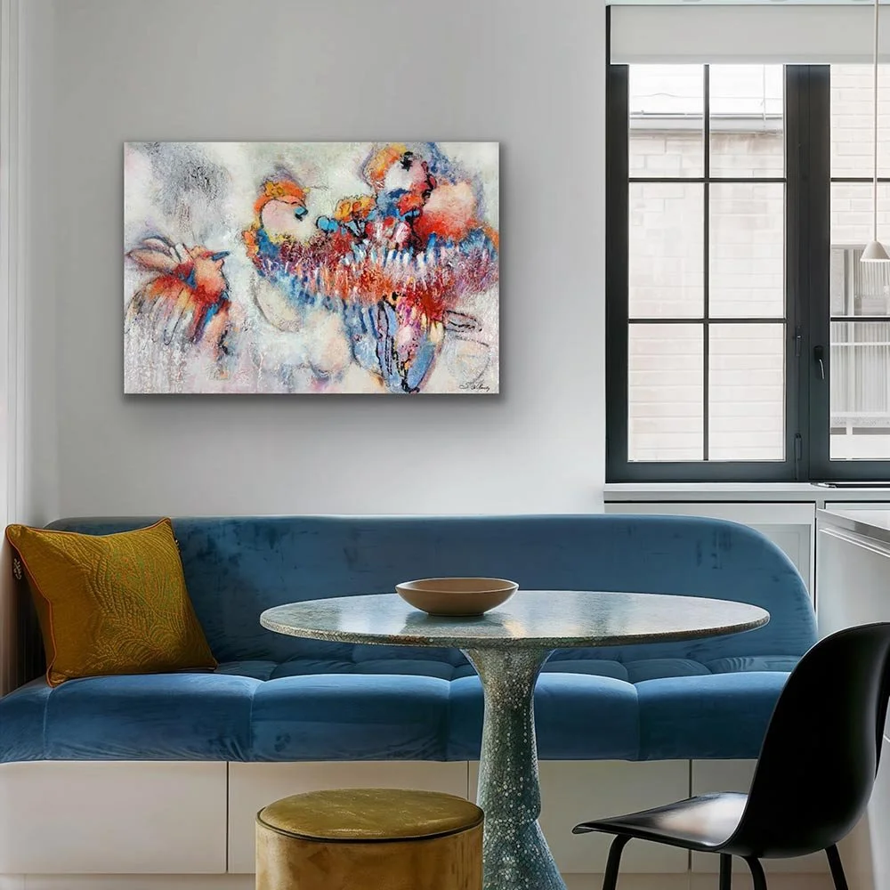 Crimson Bloom painting shown over navy sofa