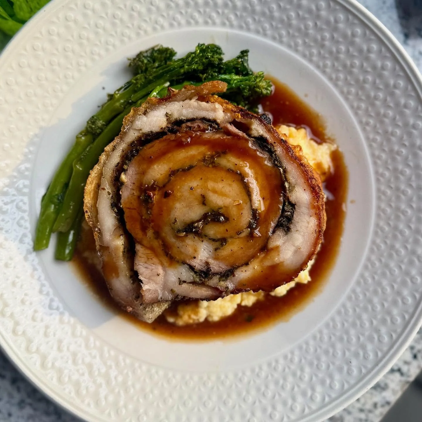 We're doing a fun little Pork Belly Porchetta special this weekend. Perfect pairing with our featured wines from Argentina this month! #porchetta #porkbelly
