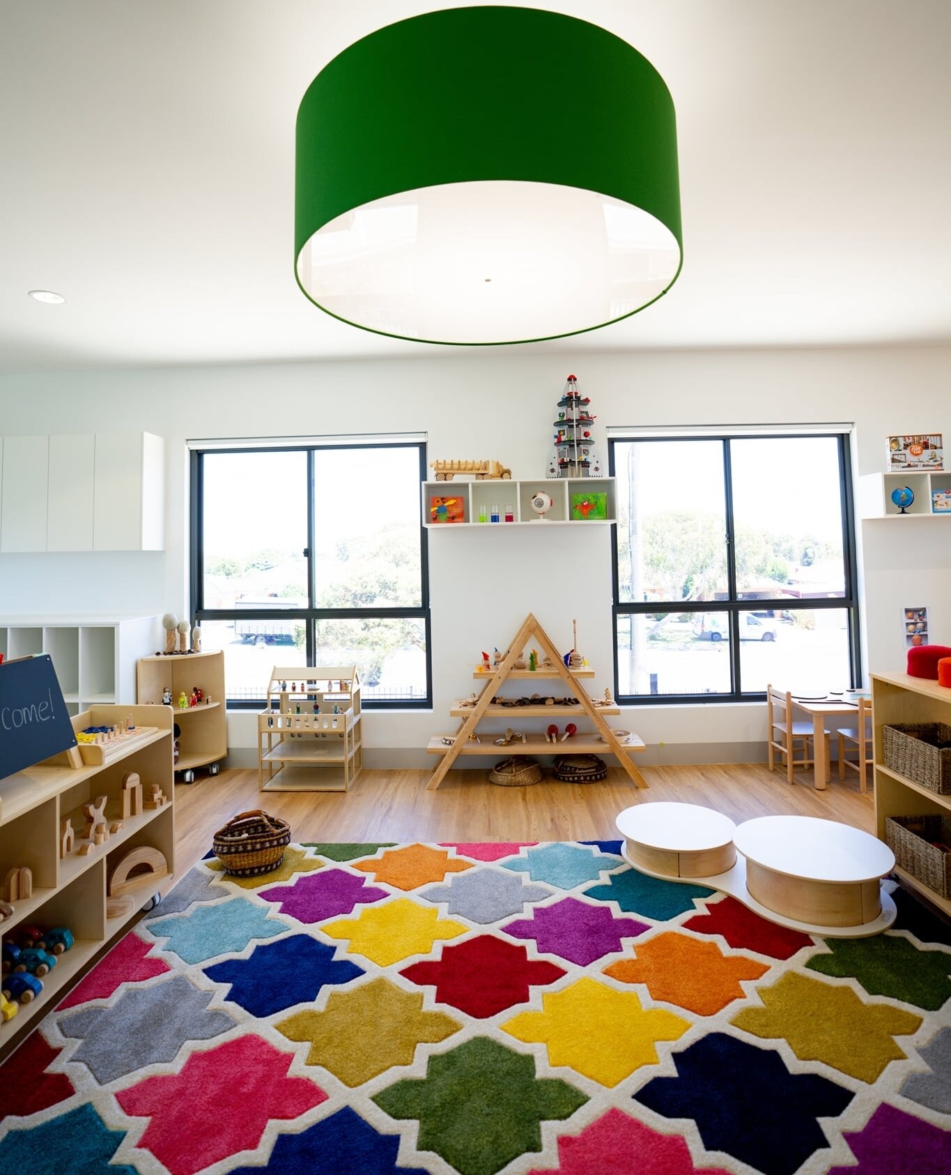 We love using colour at ISM and this recently completed Childcare Centre in Melbourne was a chance to have fun with our feature Drum Pendants.⁠ ⁠
⁠
📷 @learningladderelc