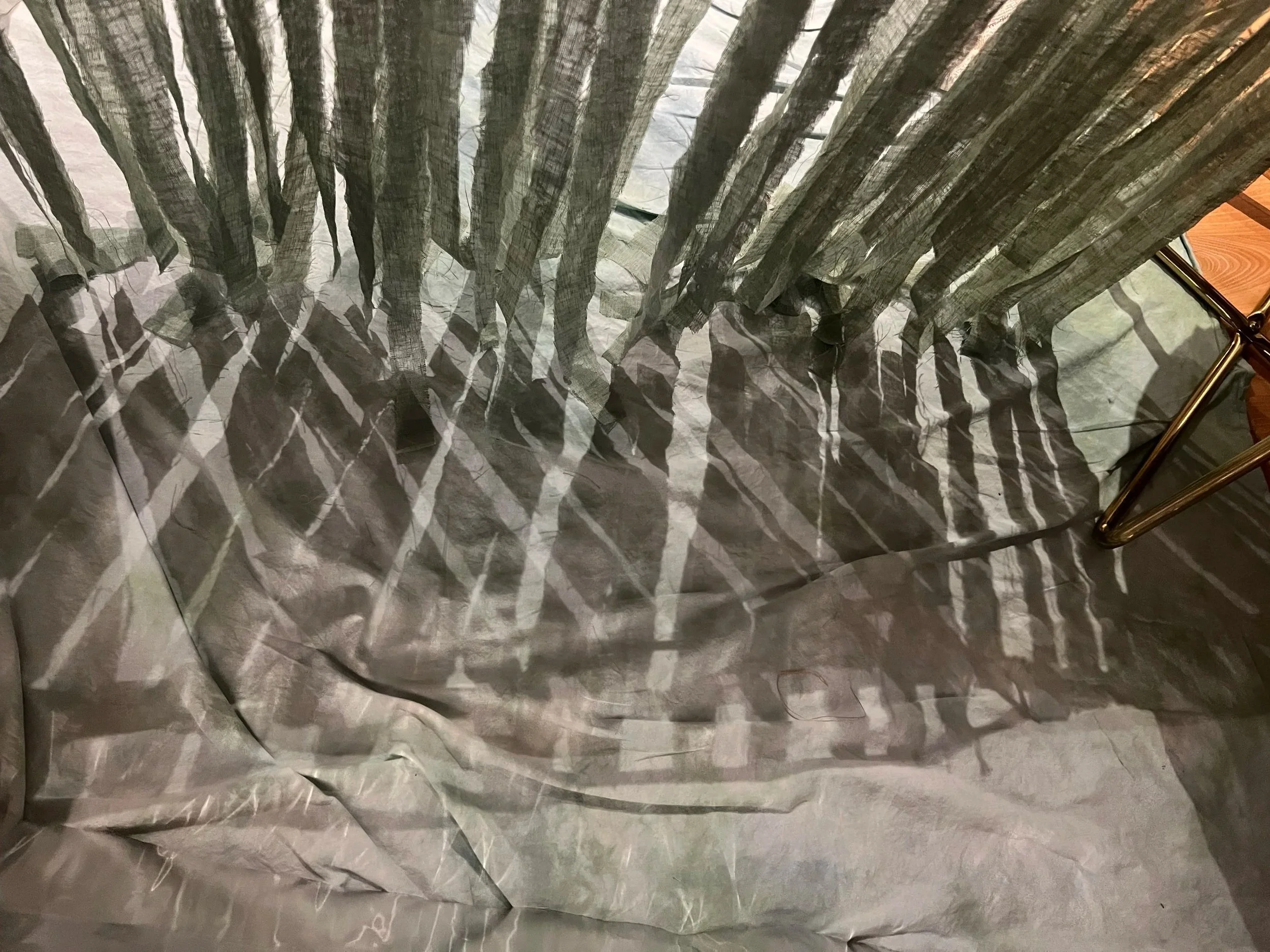 Containing fabric "water" in foil to explore the impact of the French arpent system on New Orleans' natural resources 
