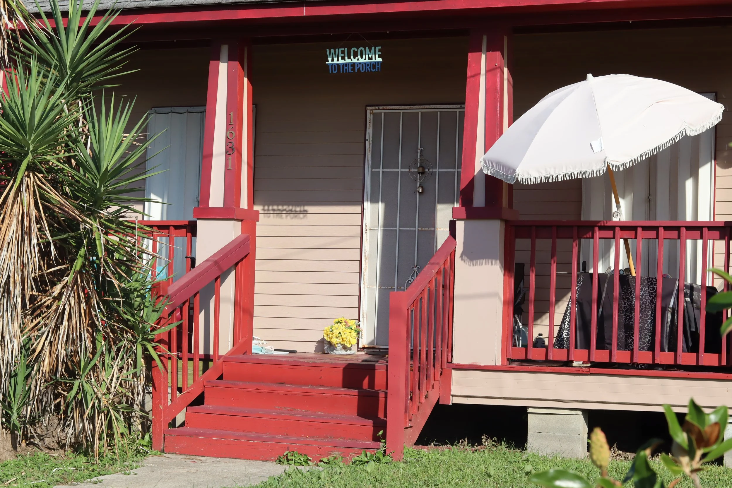 "Welcome to the Porch," photograph of porch on Jourdan Ave, 2025