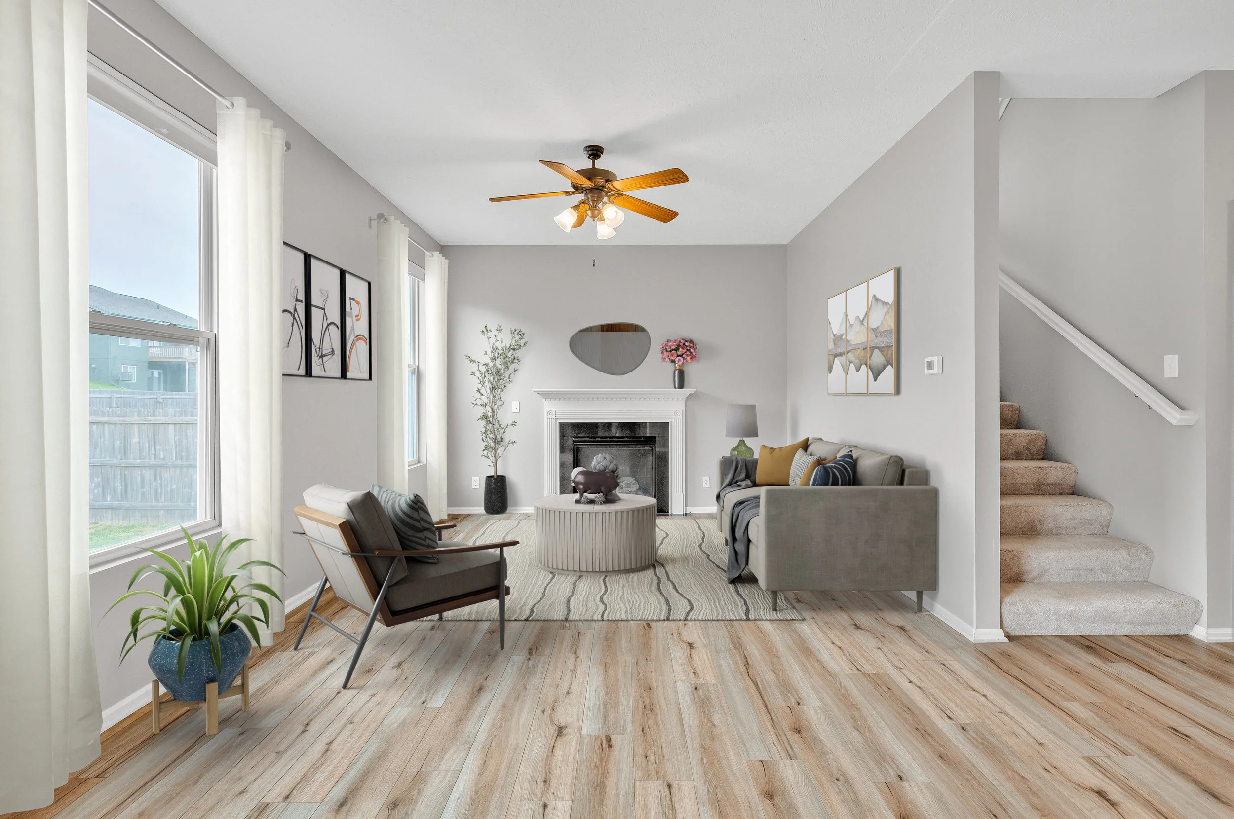 Virtually staged living room with modern furniture, fireplace, and natural light demonstrating how virtual staging transforms an empty space for online listings