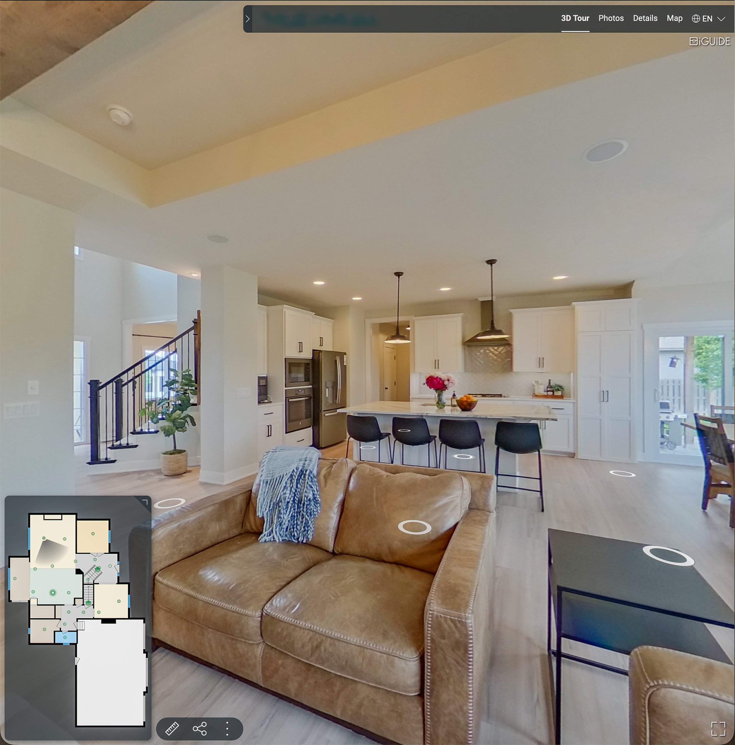 iGUIDE 3D virtual tour interface showing floor plan overlay and open-concept kitchen — Gabriel Khan Media