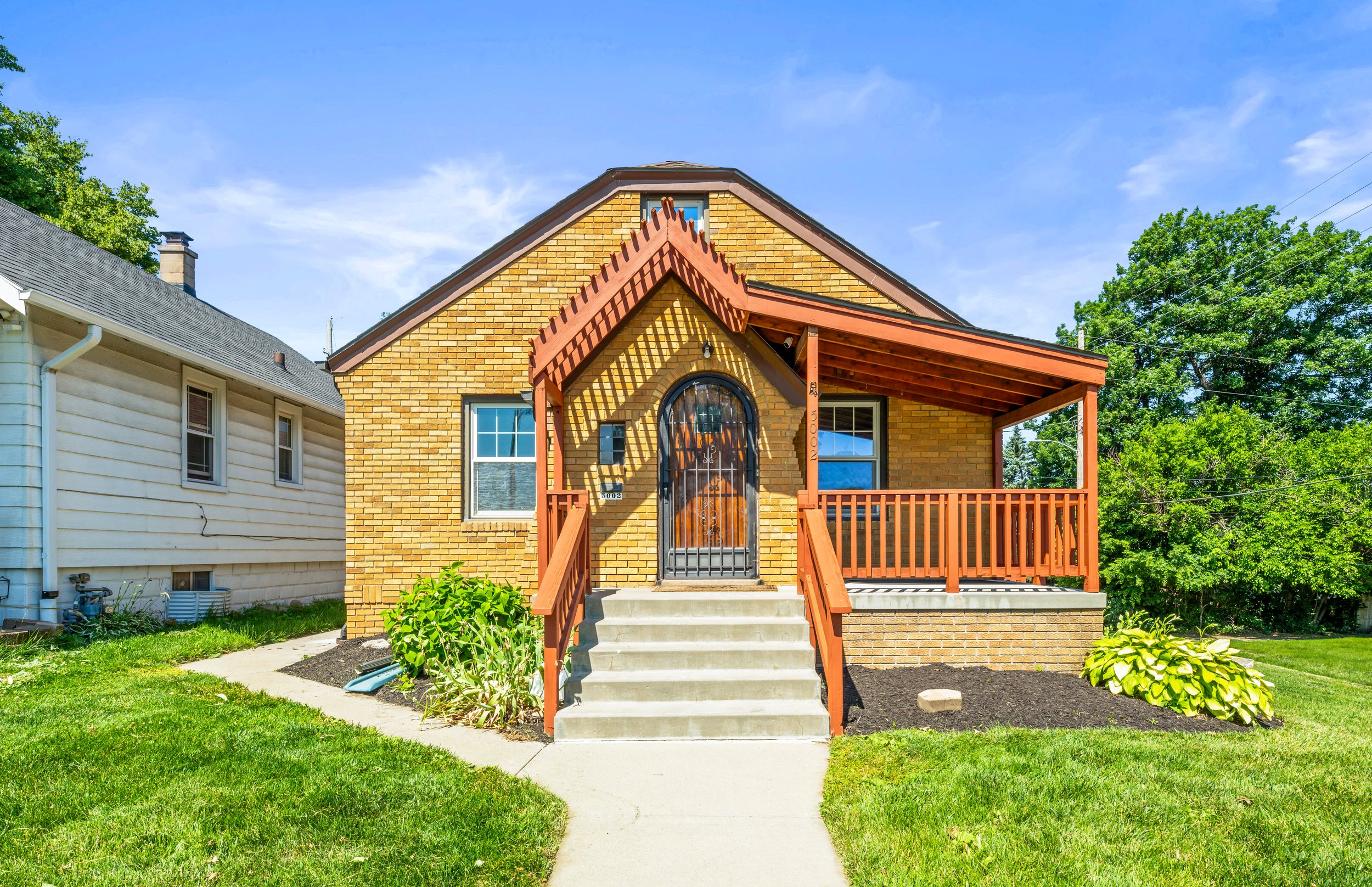 Home exterior showcasing HDR real estate photography by Gabriel Khan Media