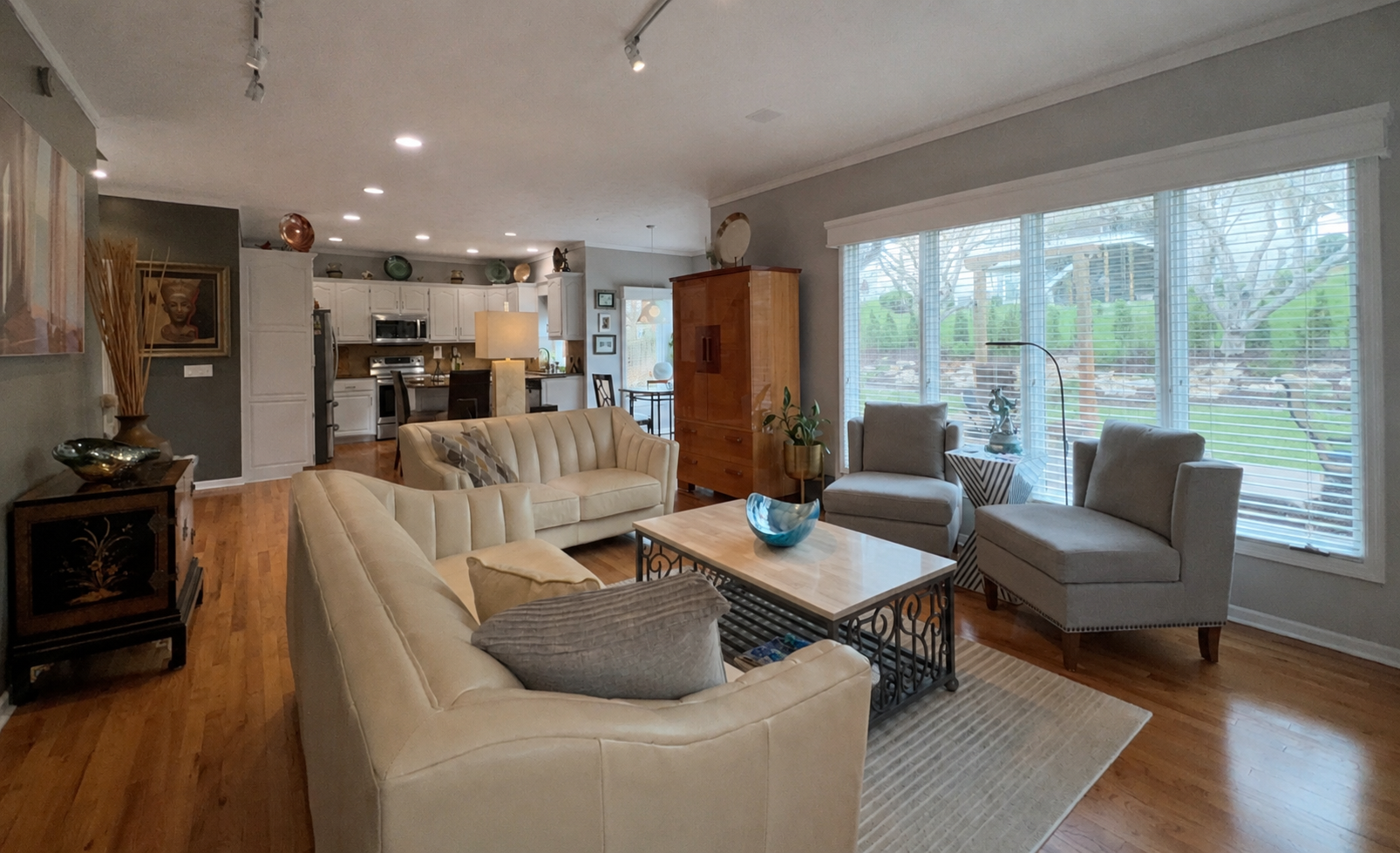 Low quality real estate listing photo showing flat lighting and blown out windows