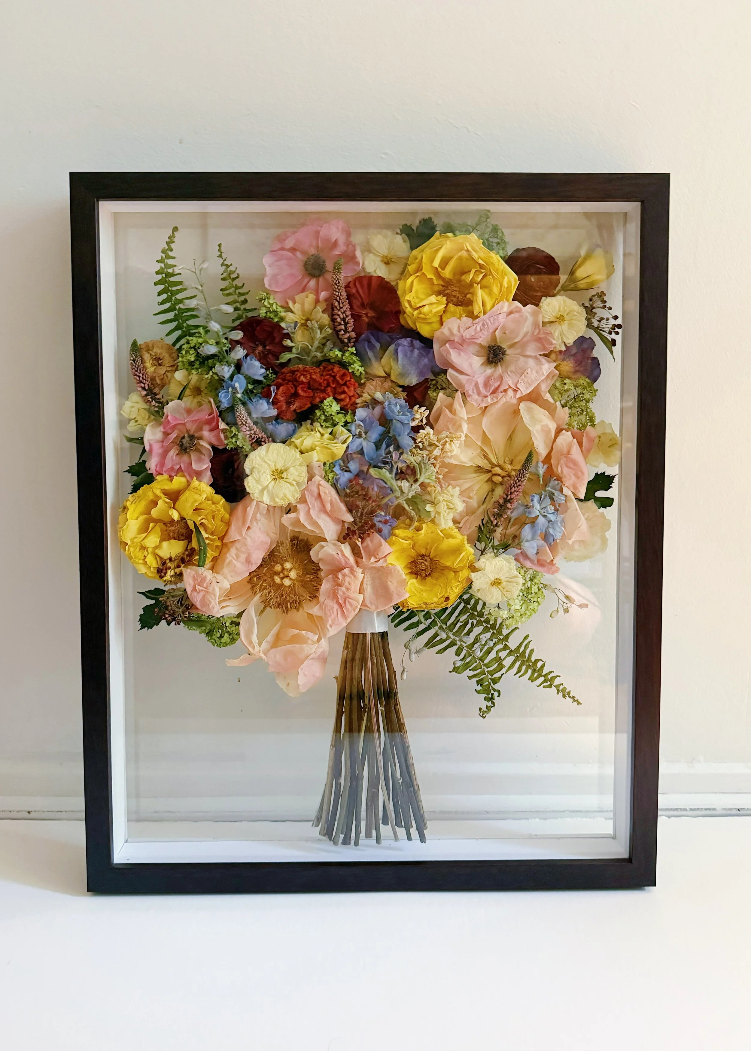 Best wedding bouquet preservation service in Atlanta. Frame pressed and dried florals into artwork. Heirloom wedding keepsakes and gifts. Wedding bouquet frames and pressed flower frames for brides. Turn your wedding flowers into art.