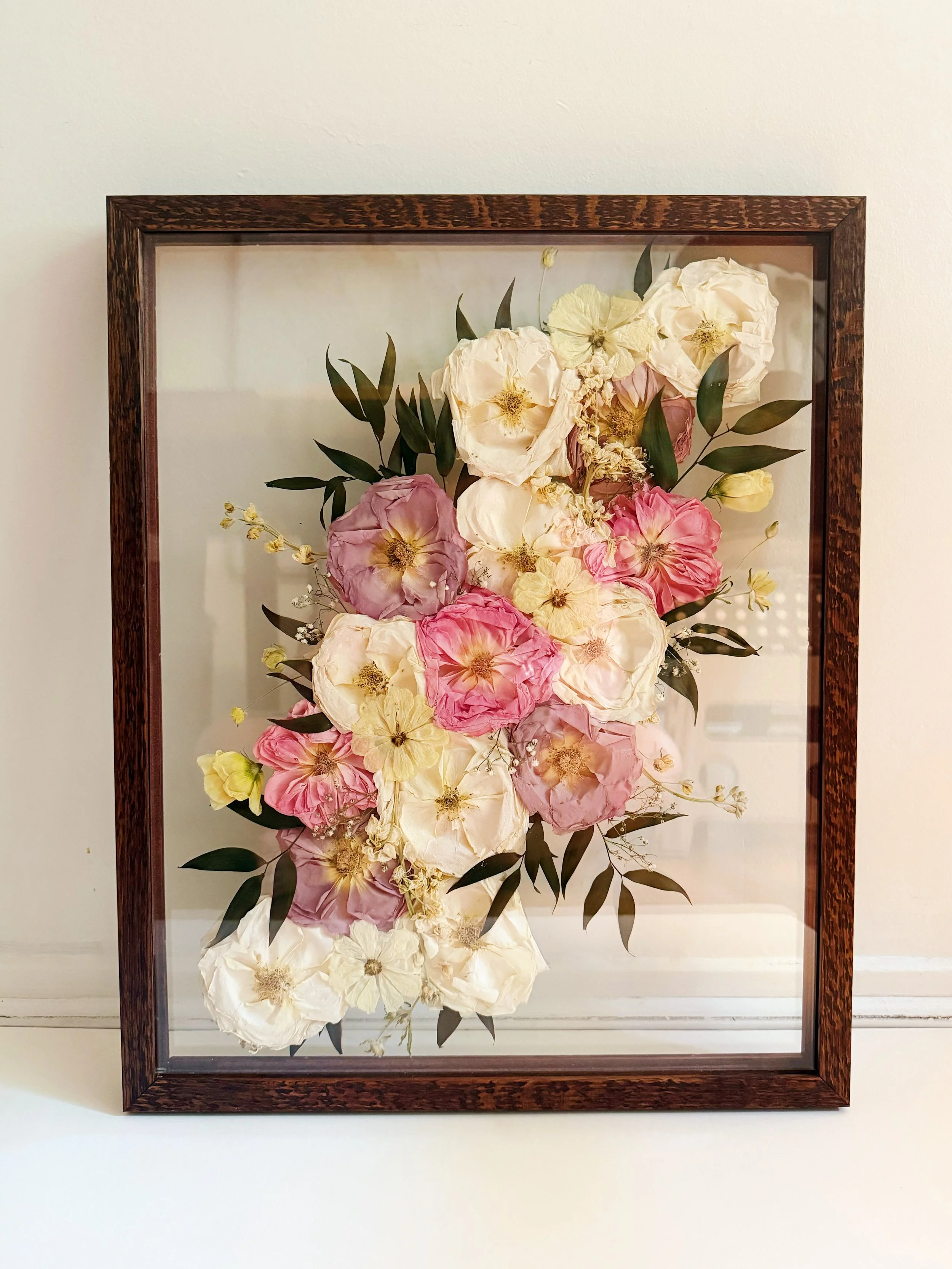 Best wedding bouquet preservation service in Atlanta. Frame pressed and dried florals into artwork. Heirloom wedding keepsakes and gifts. Wedding bouquet frames and pressed flower frames for brides. Turn your wedding flowers into art.