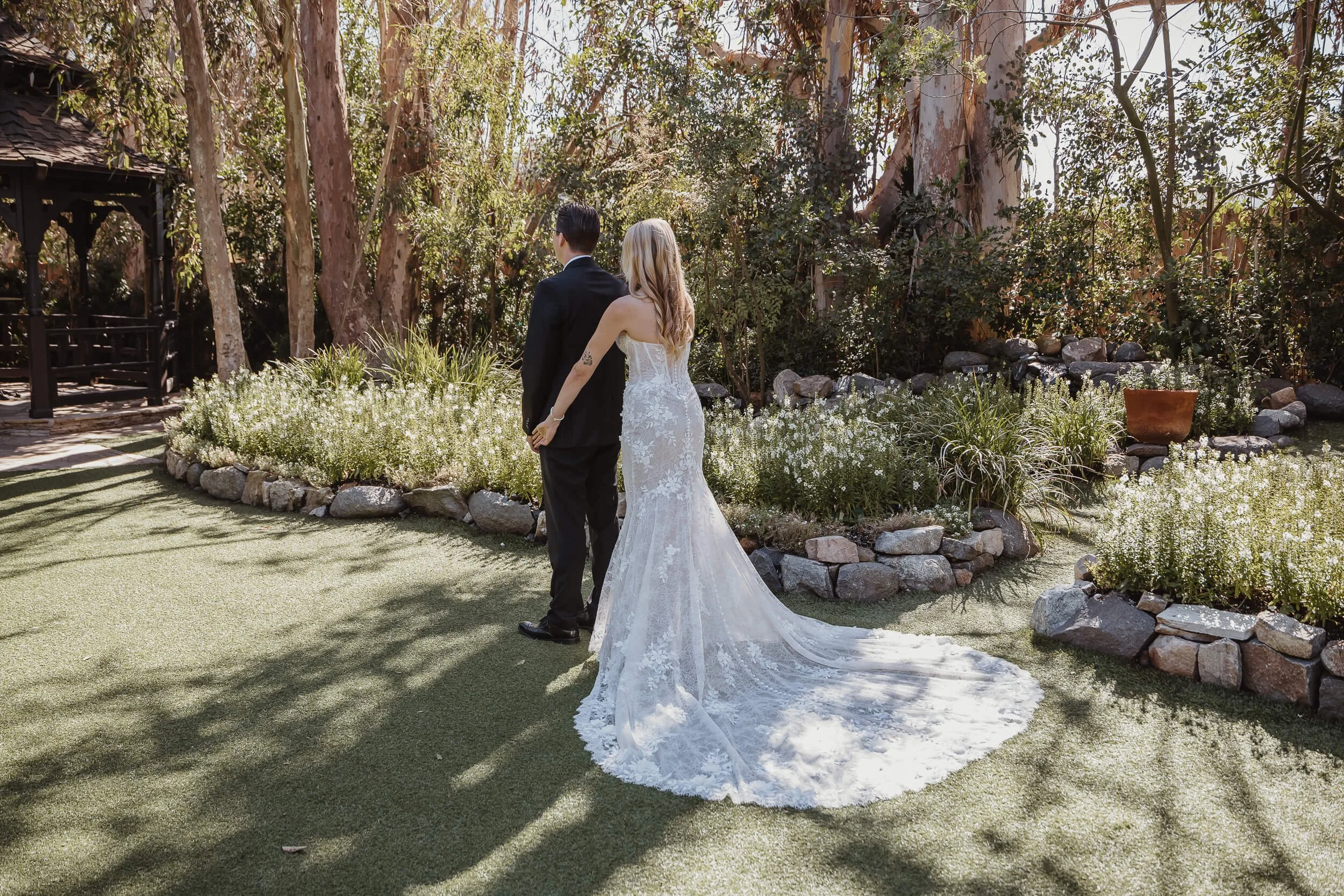 Bride and groom first look at Twin Oaks House & Gardens Estate Wedding venue