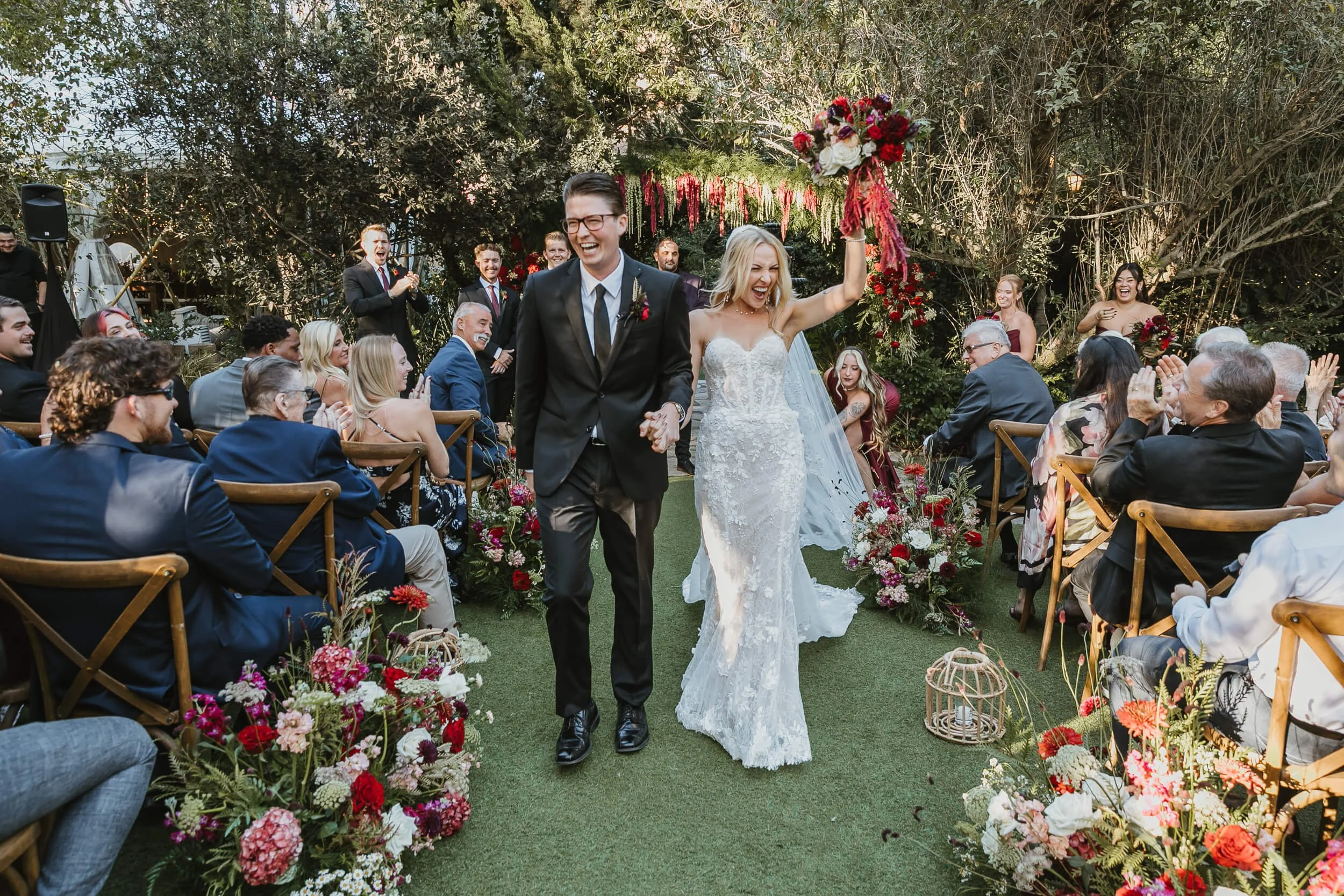 Wedding ceremony exit at Twin Oaks House & Gardens Estate Wedding photographed by San Diego wedding photographer