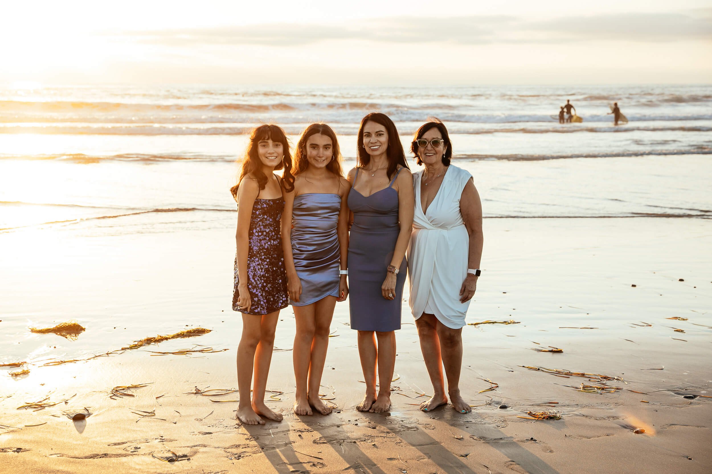 Family photography session by the ocean photographed by a Carlsbad wedding photographer