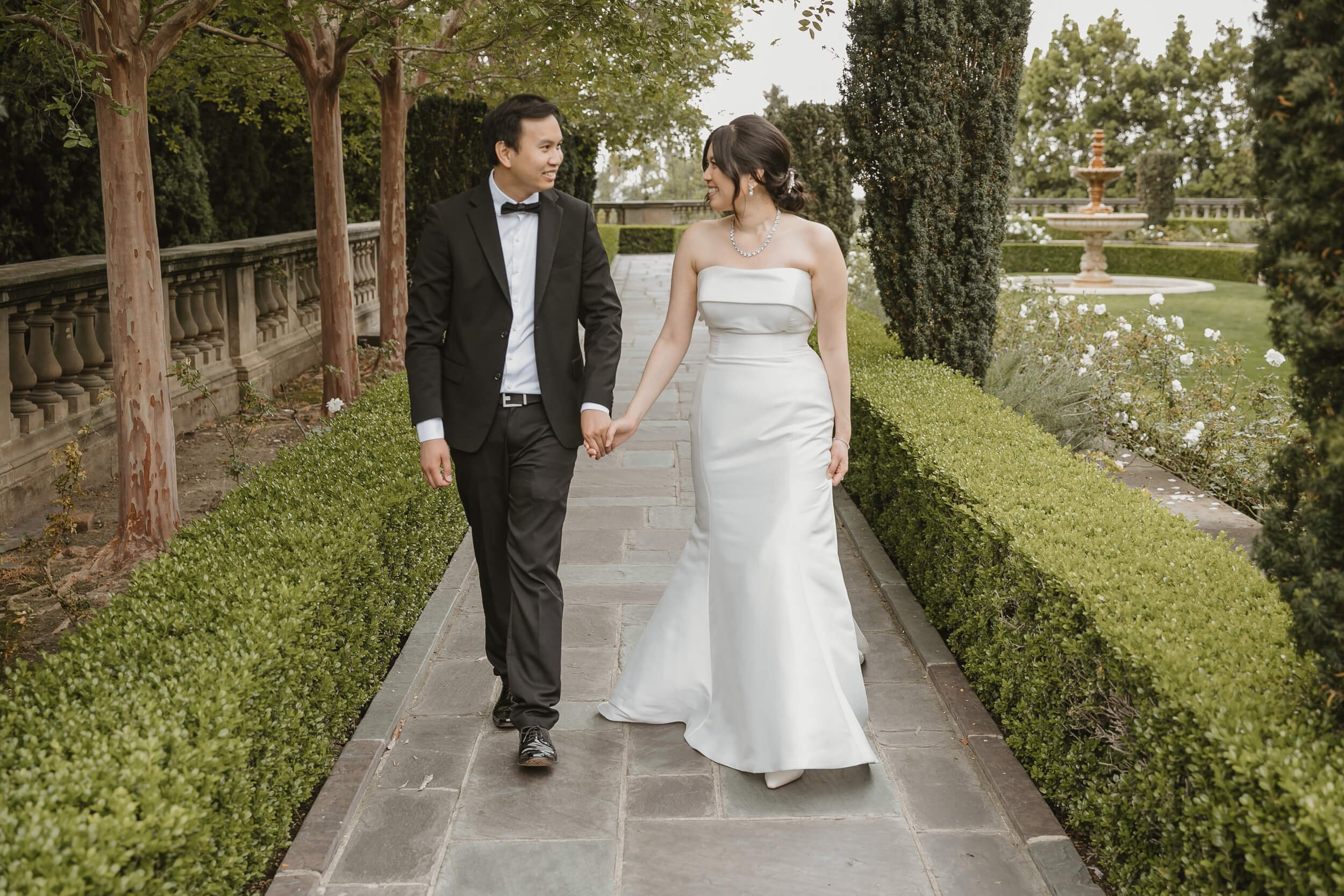 Casual walk bride and groom at Greystone Mansion and Gardens for Engagement Photo session in Beverly Hills