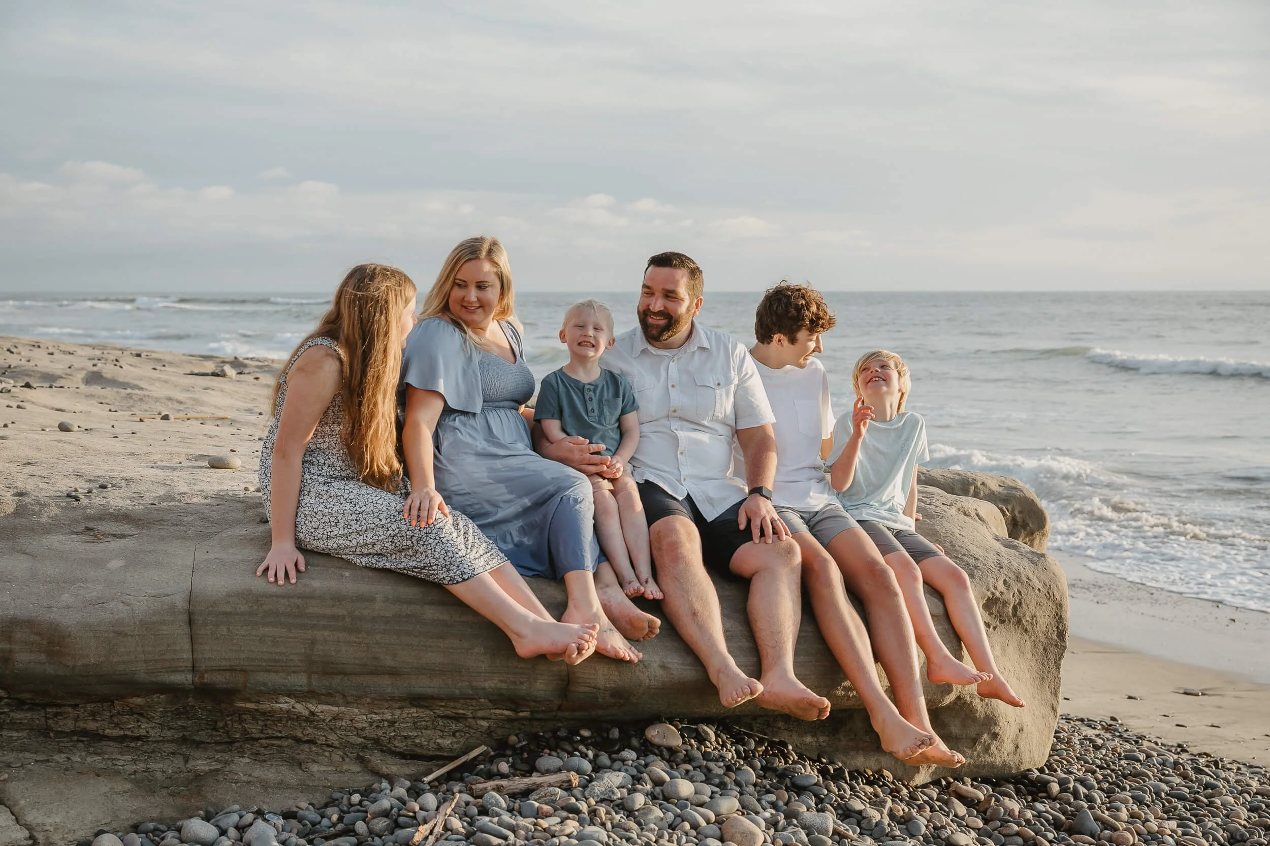 Natural beach family photography session during golden hour in Southern California