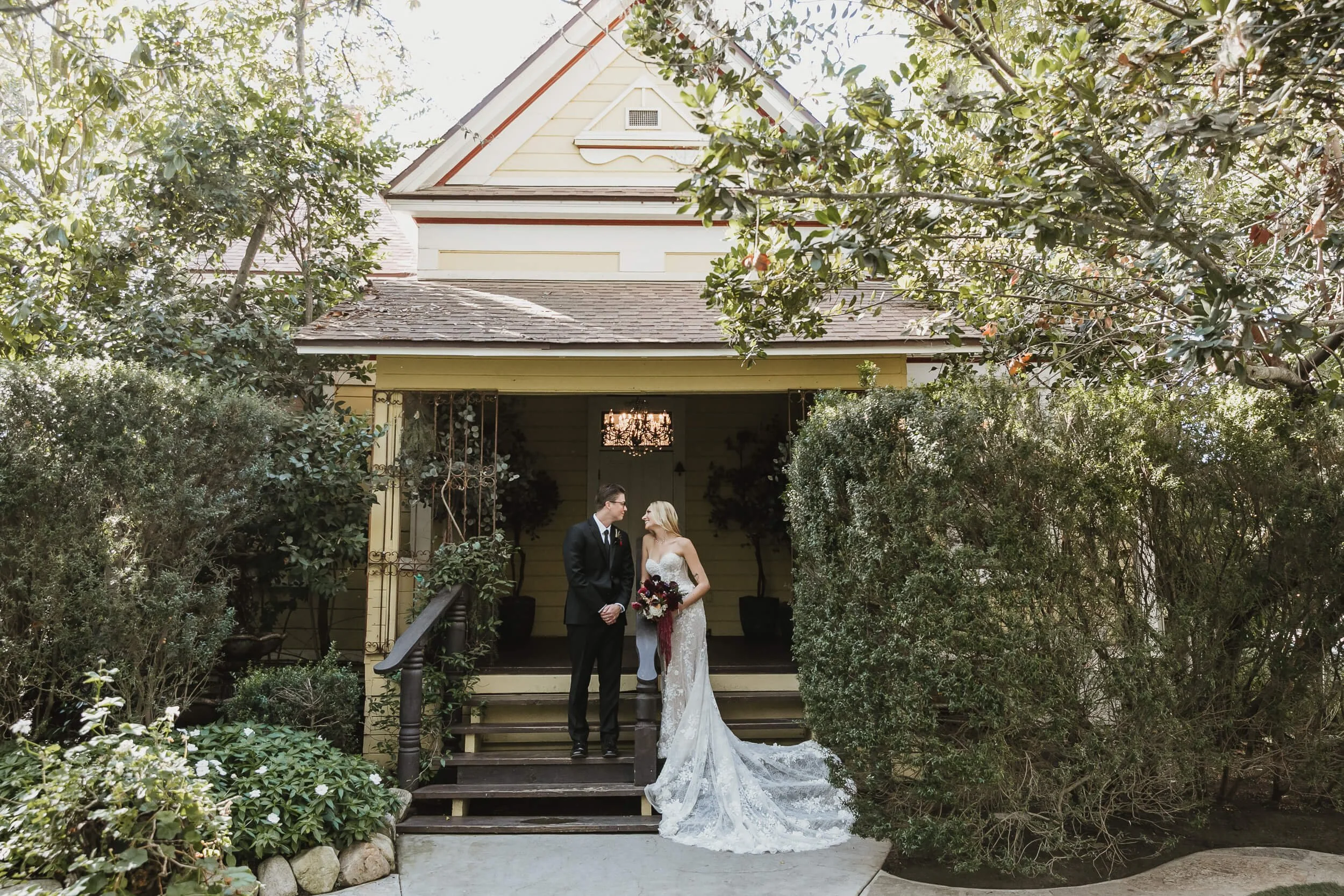 Couple portrait outside Twin Oaks House & Gardens Estate Wedding reception building