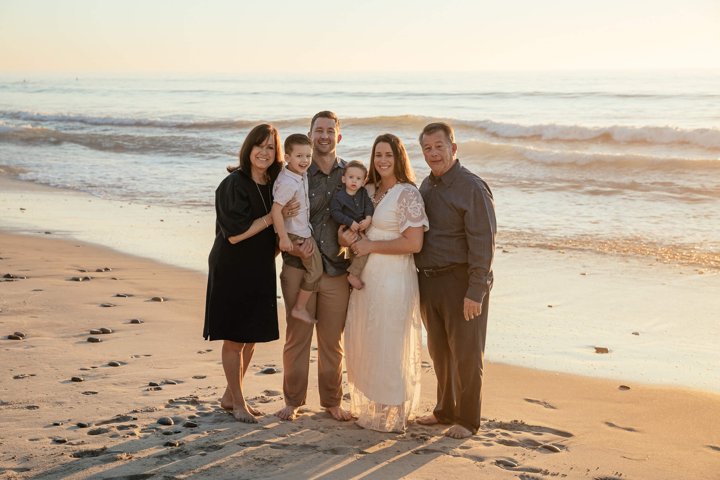 Extended family beach session during golden hour in Southern California