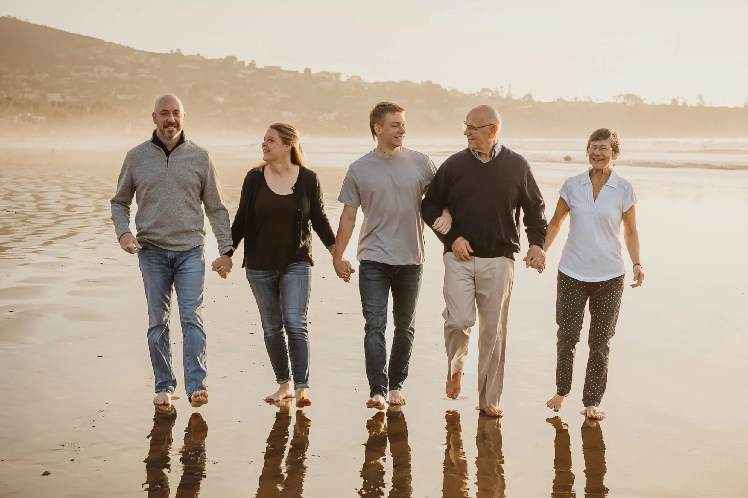 Family of five during La Jolla Shores golden hour portrait session for holiday cards 