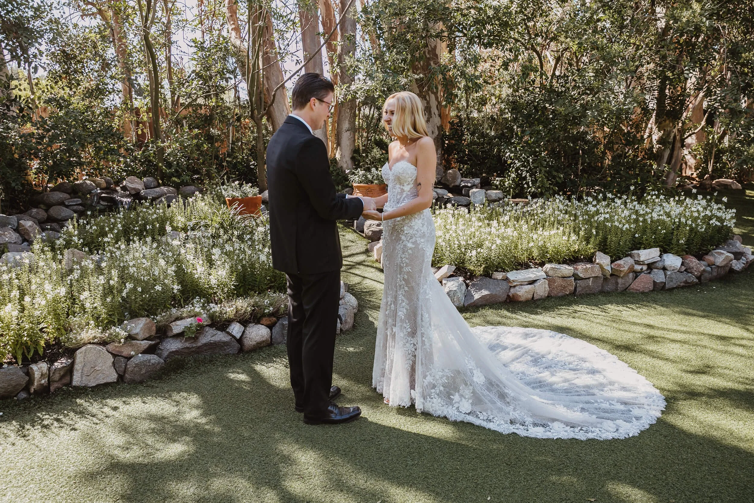 Romantic first look moment at Twin Oaks House & Gardens Estate Wedding photographed by Carlsbad wedding photographer