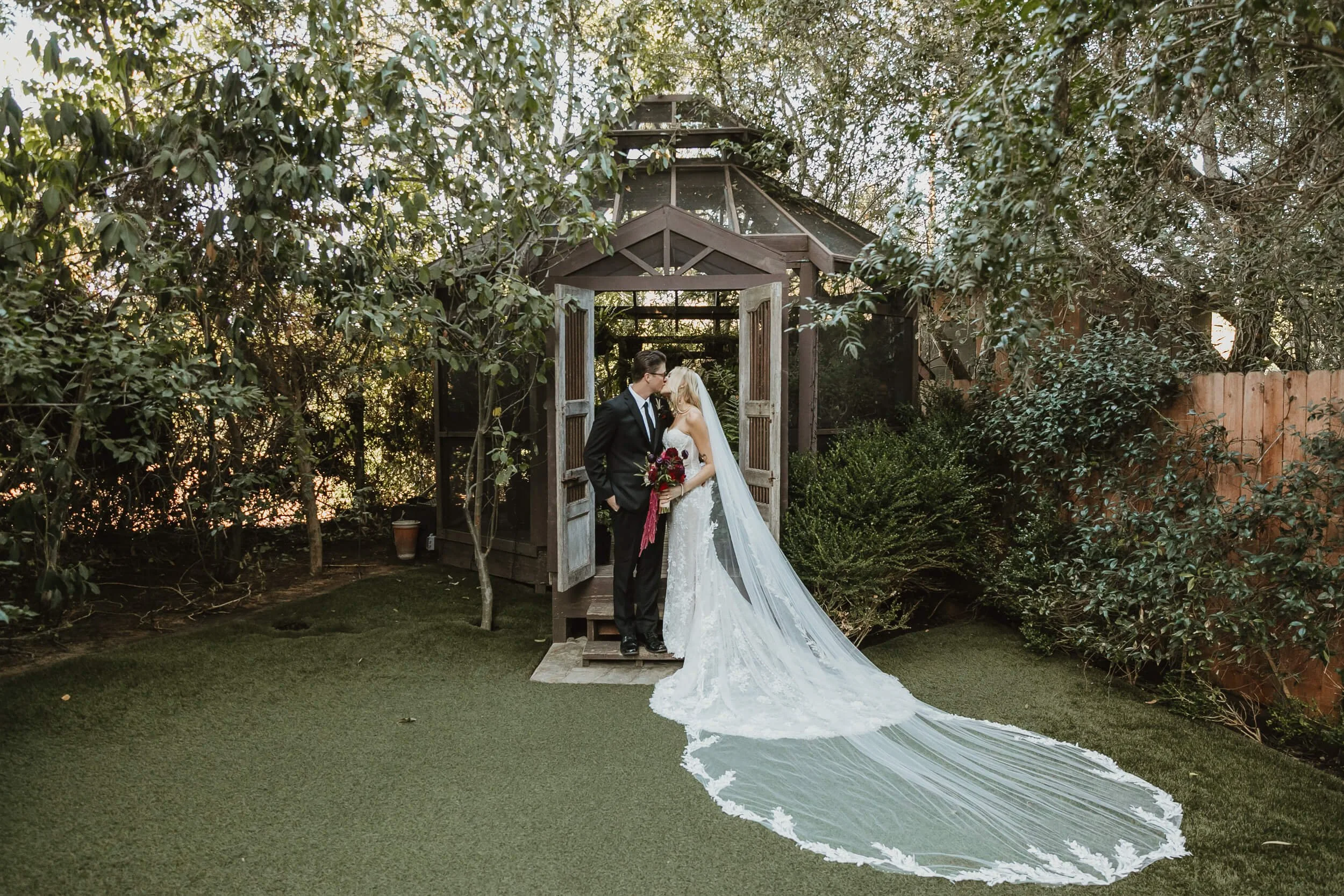 Bride and groom portrait at gazebo during Twin Oaks House & Gardens Estate Wedding