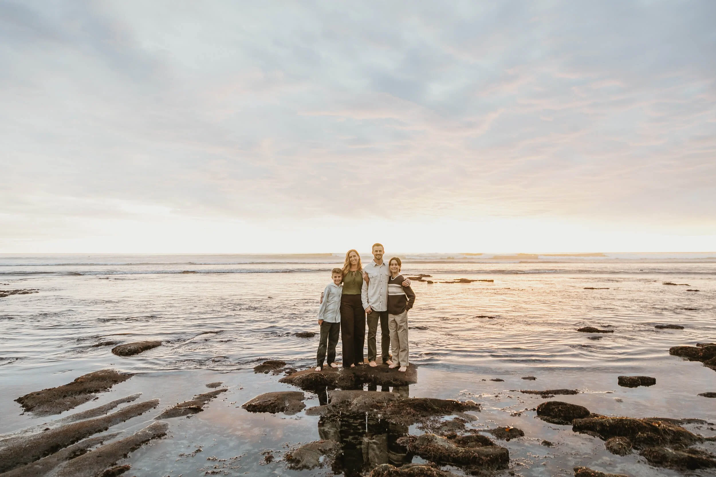 Sunset beach family portrait photographed during a Carlsbad Beach Family Photography Session