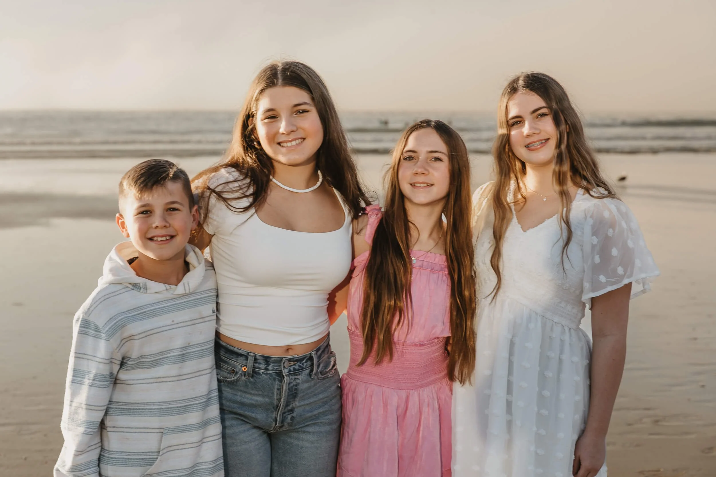 Four kids together at La Jolla Shores Beach photography session in San Diego, California