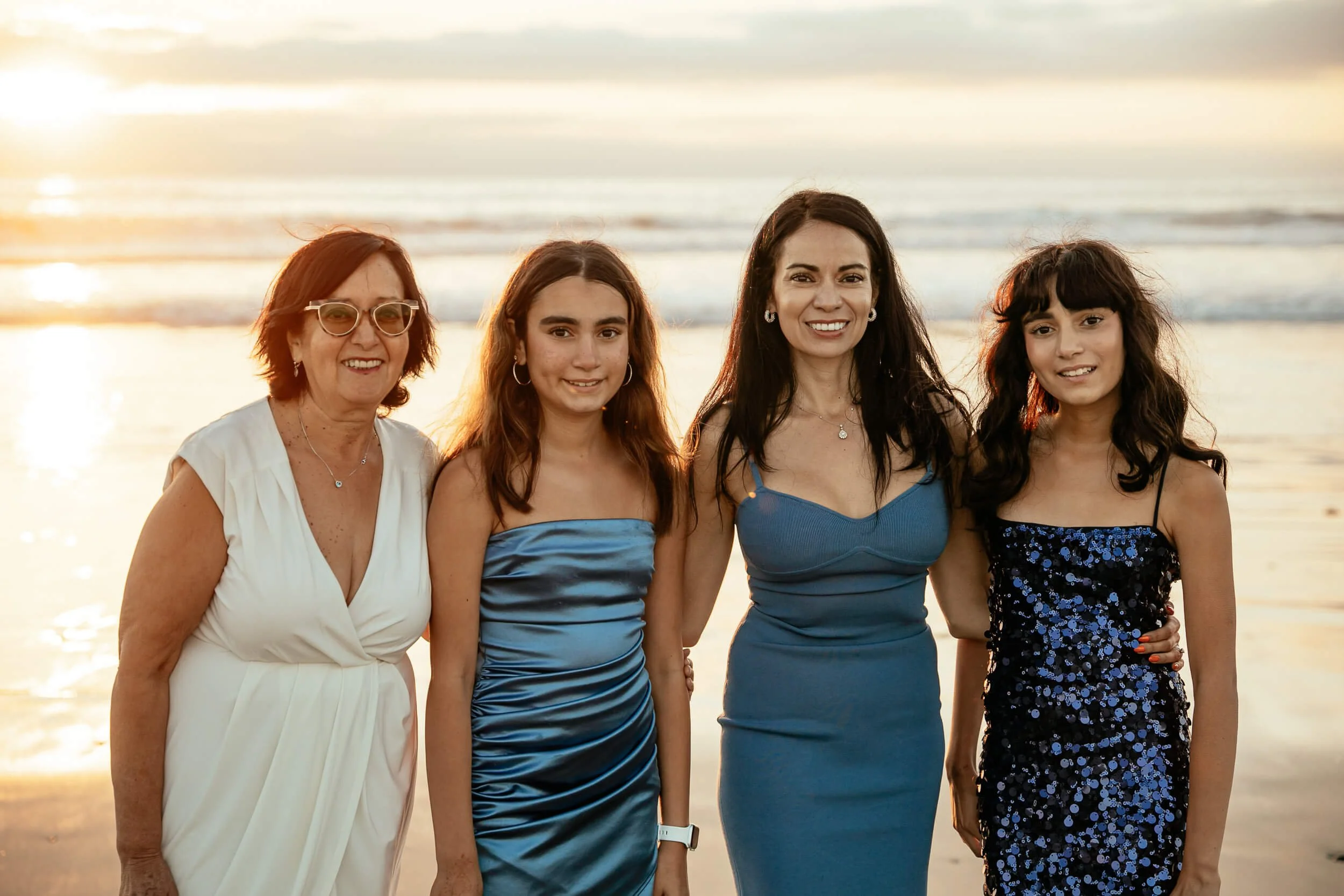 Multi generational family portrait during golden hour photographed by a Carlsbad wedding photographer