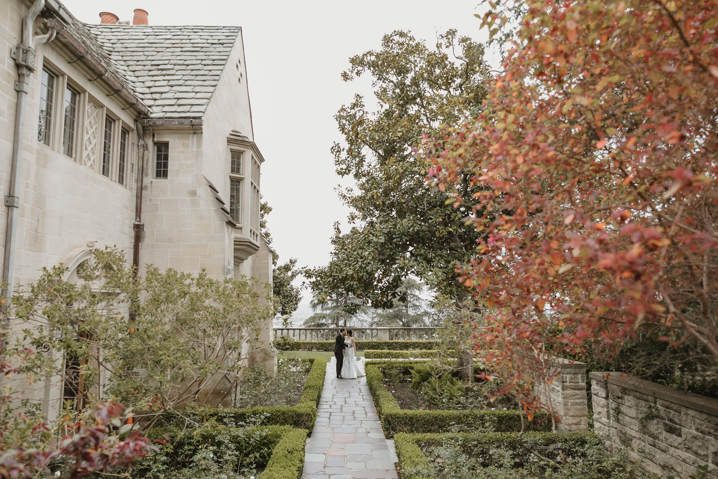 Couple walking at Greystone Mansion and Gardens in Beverly Hills for engagement photography session