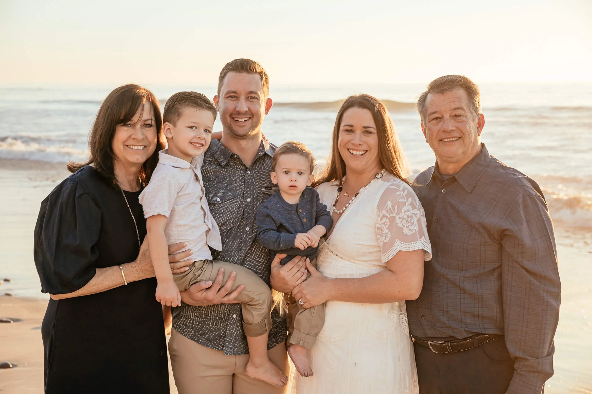 Multi generational family portrait at the beach in Carlsbad, California