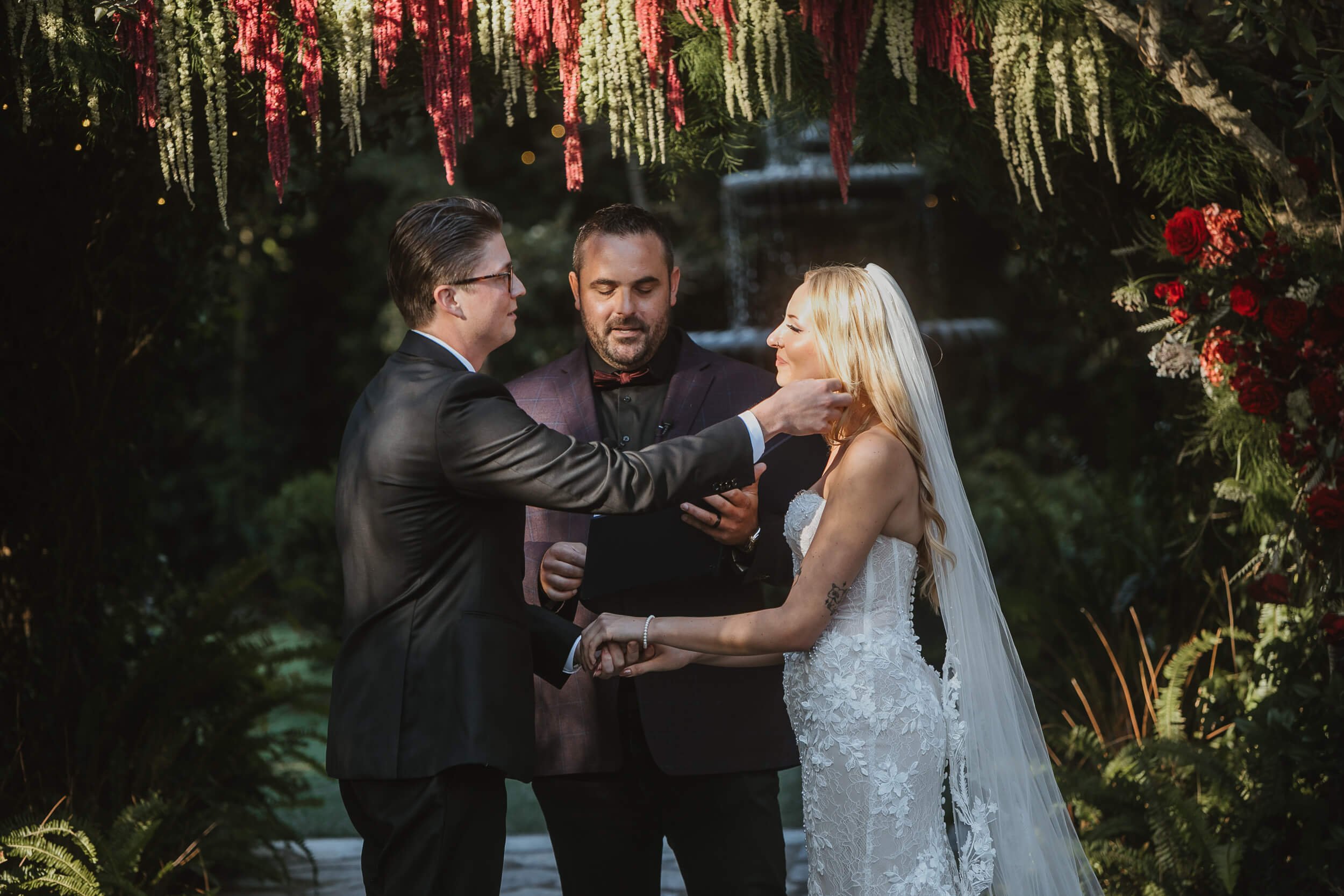 Bride and groom exchanging vows at Twin Oaks House & Gardens Estate Wedding ceremony