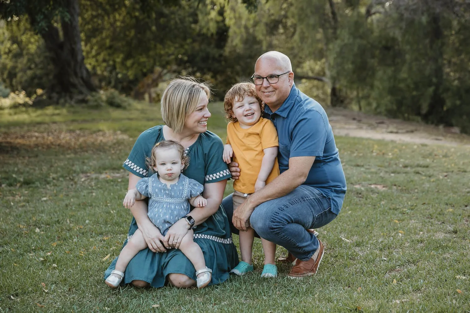 Family of four at Balboa Park for San Diego Holiday Mini Sessions