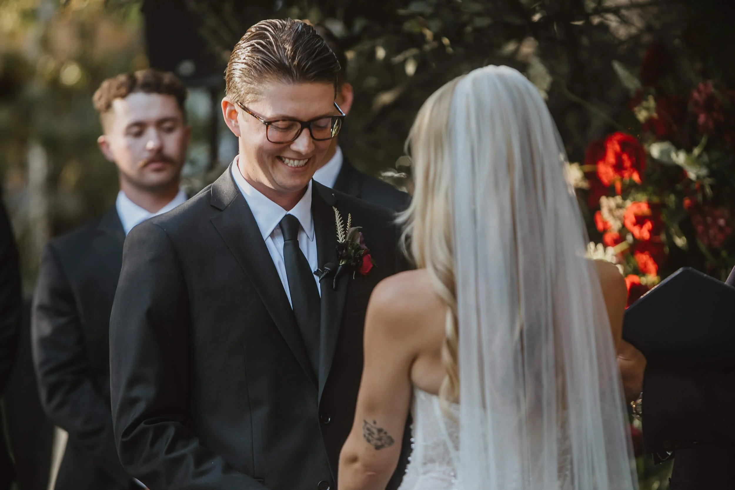 Groom reaction during Twin Oaks House & Gardens Estate Wedding photographed by Carlsbad wedding photographer