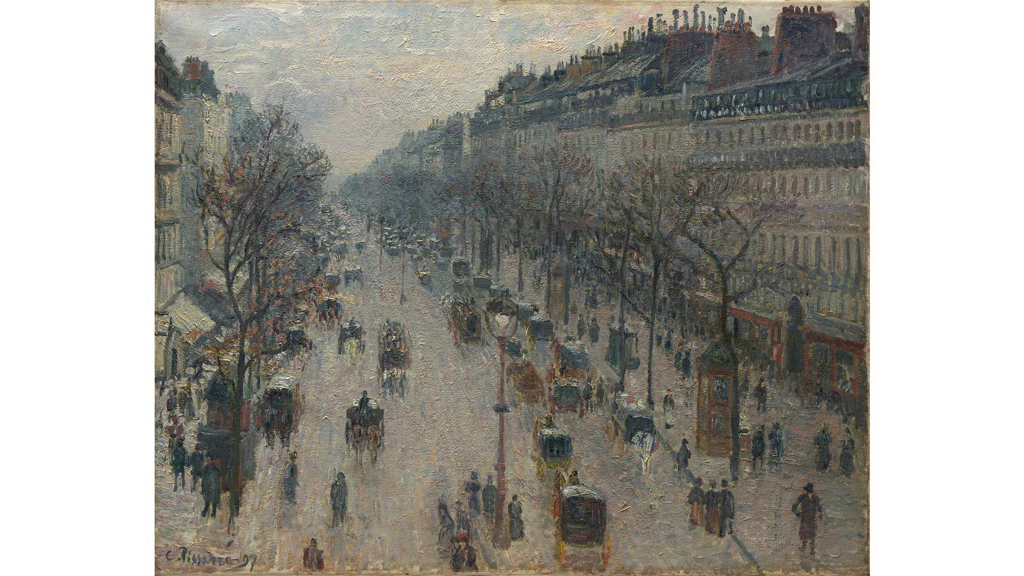 1897. The Boulevard Montmartre on a Winter Morning by Camille Pissarro.