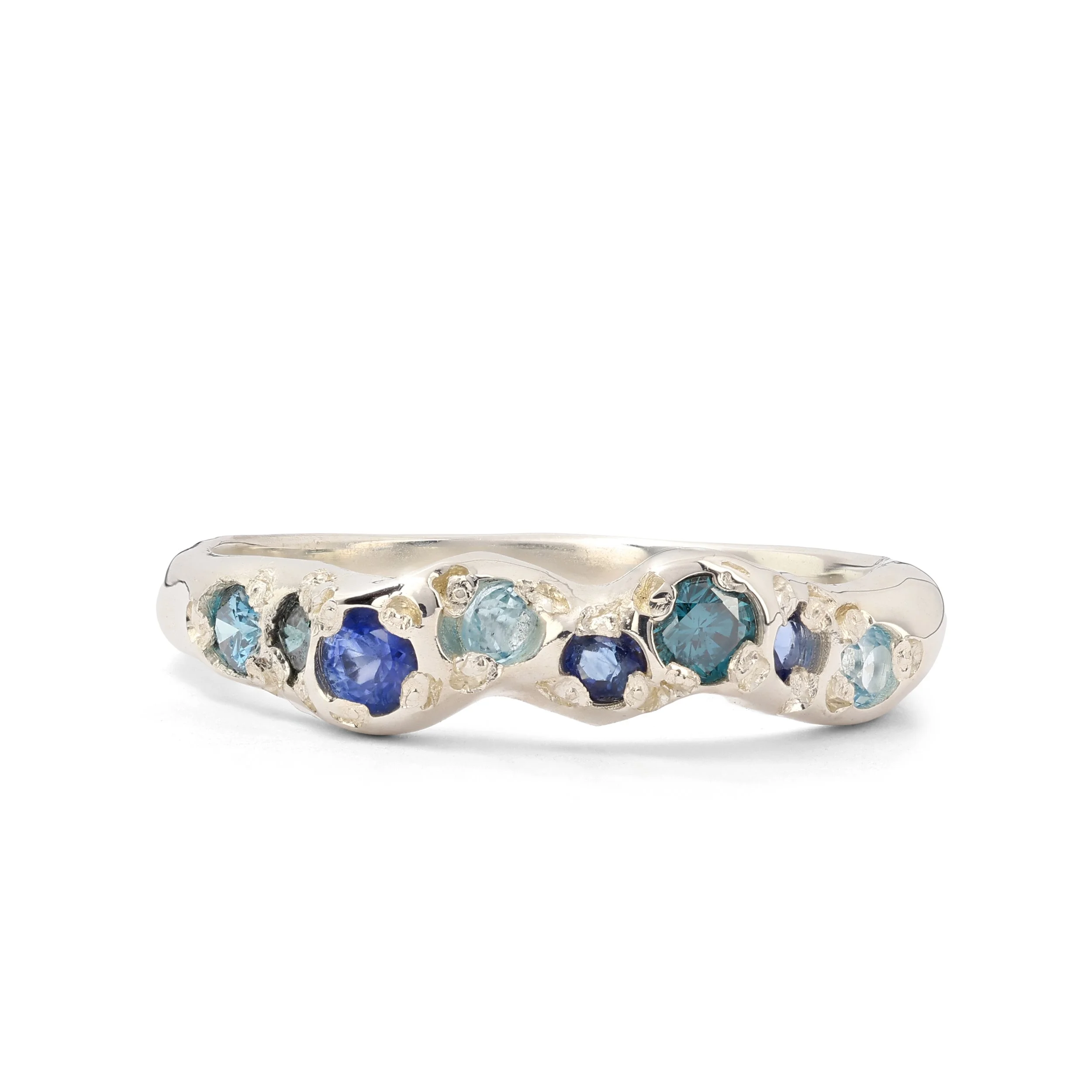 Neptune band silver - A silver molten band with blue topaz, blue diamonds and blue sapphire
